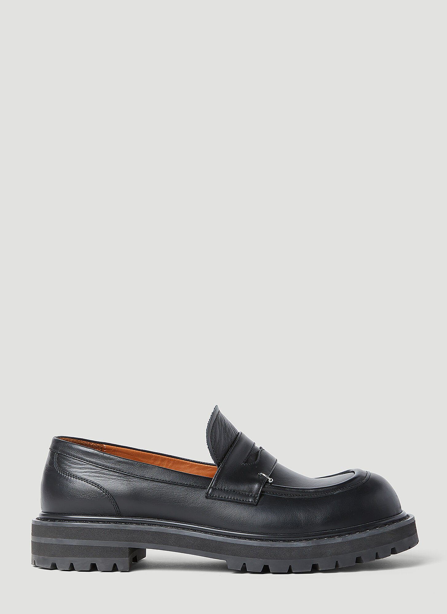 Shop Marni Pierced Leather Loafers In Black
