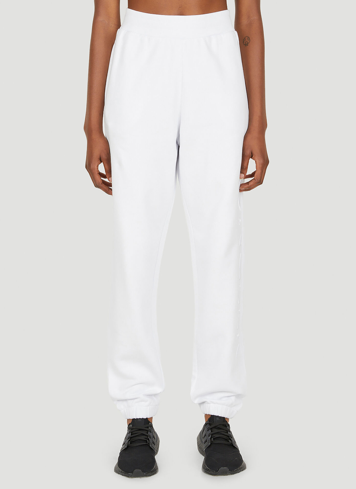 Shop Moncler Logo Embroidered Track Pants In White