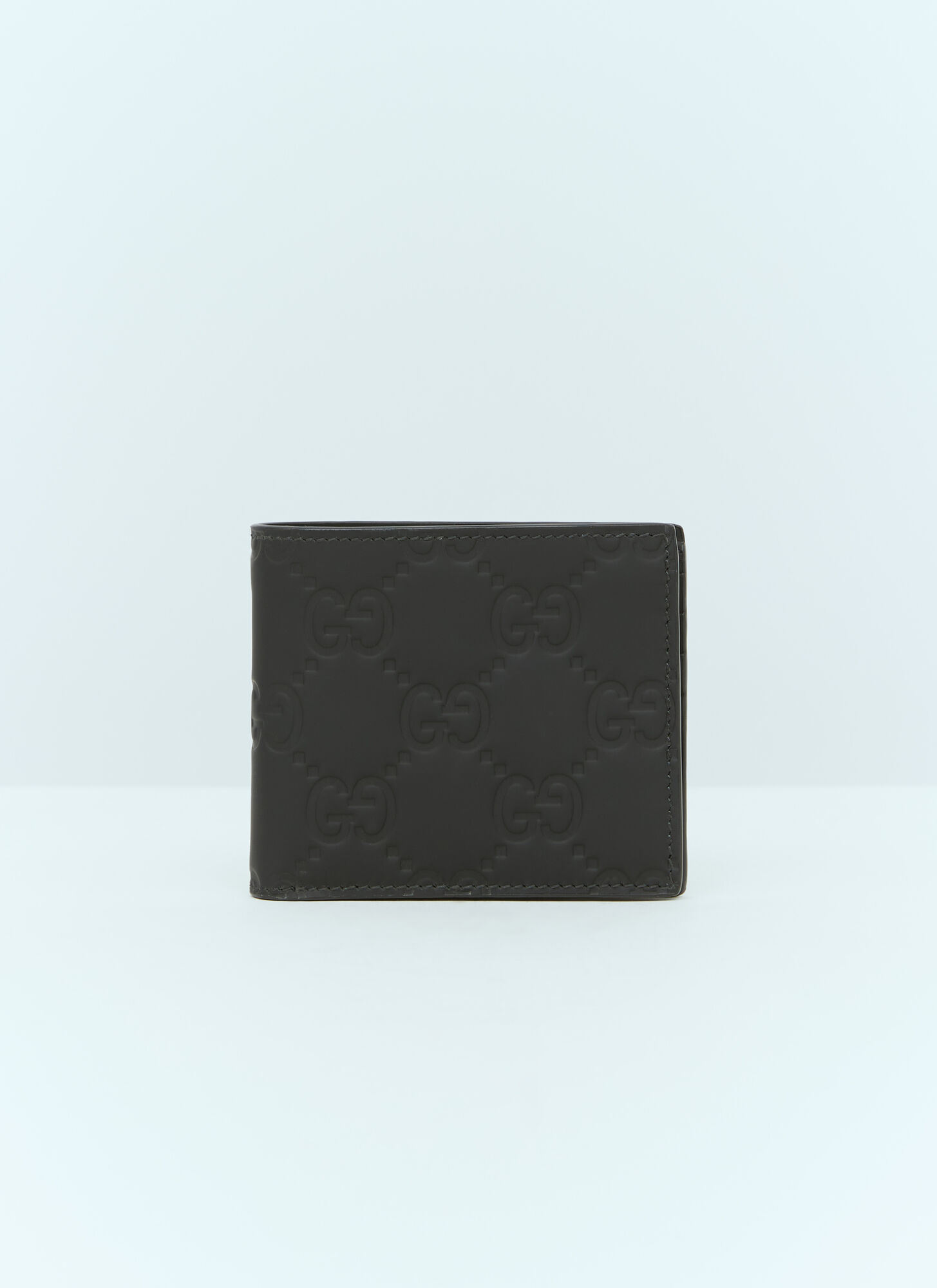 Shop Gucci Gg Rubber Effect-bi-fold Wallet In Black