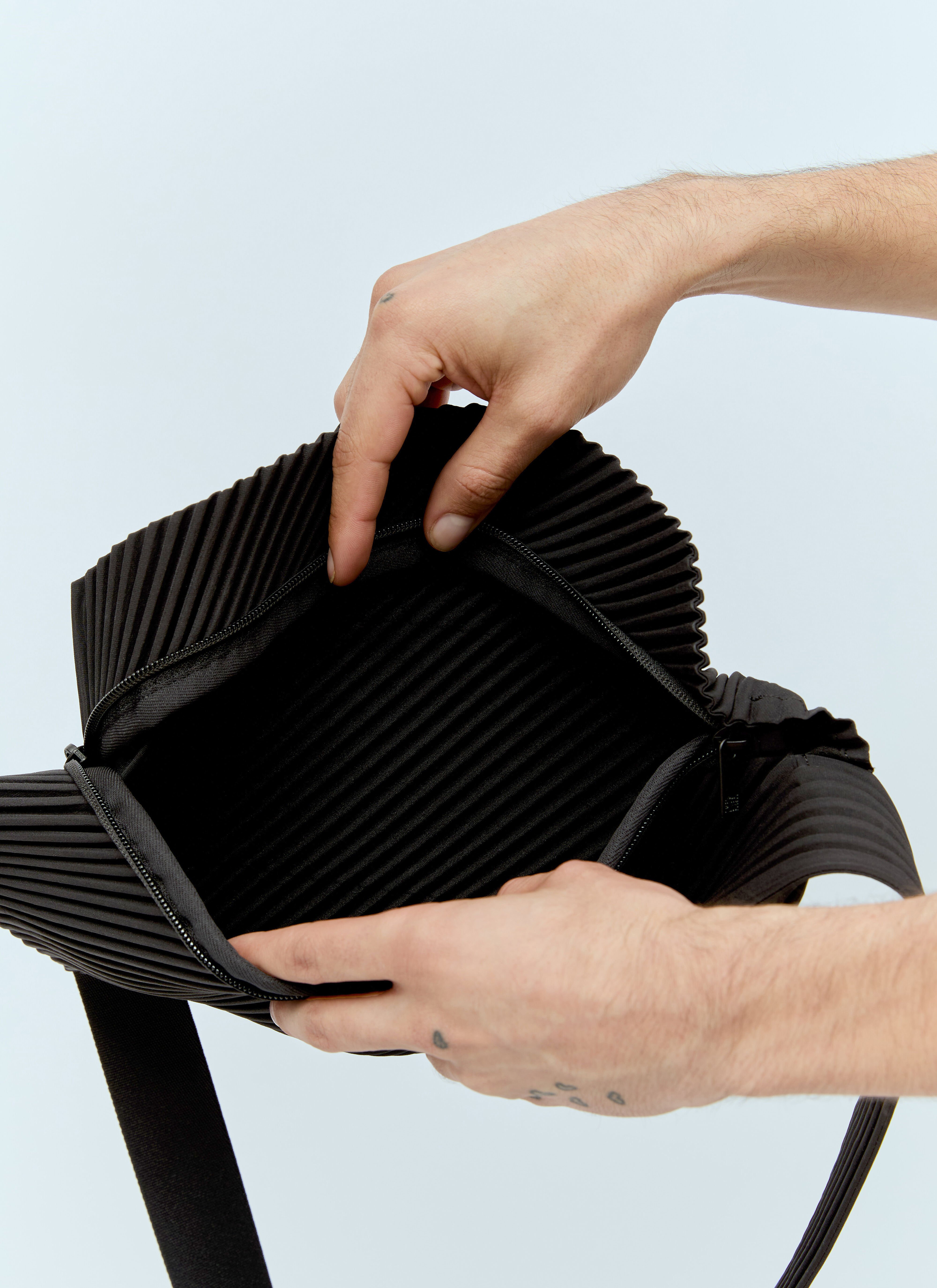 Issey miyake homme plisse bag online