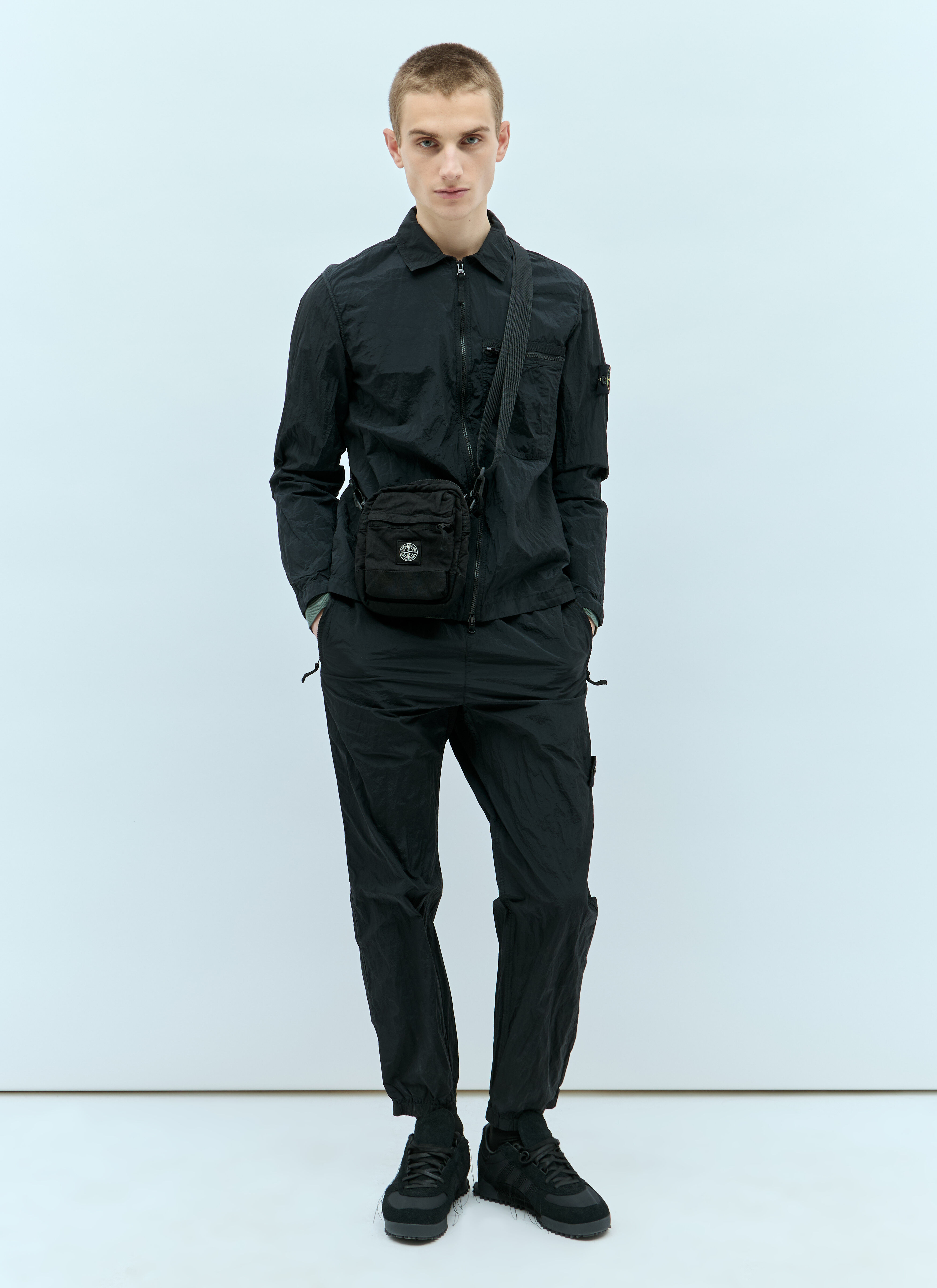 Stone island logo patch track pants sales