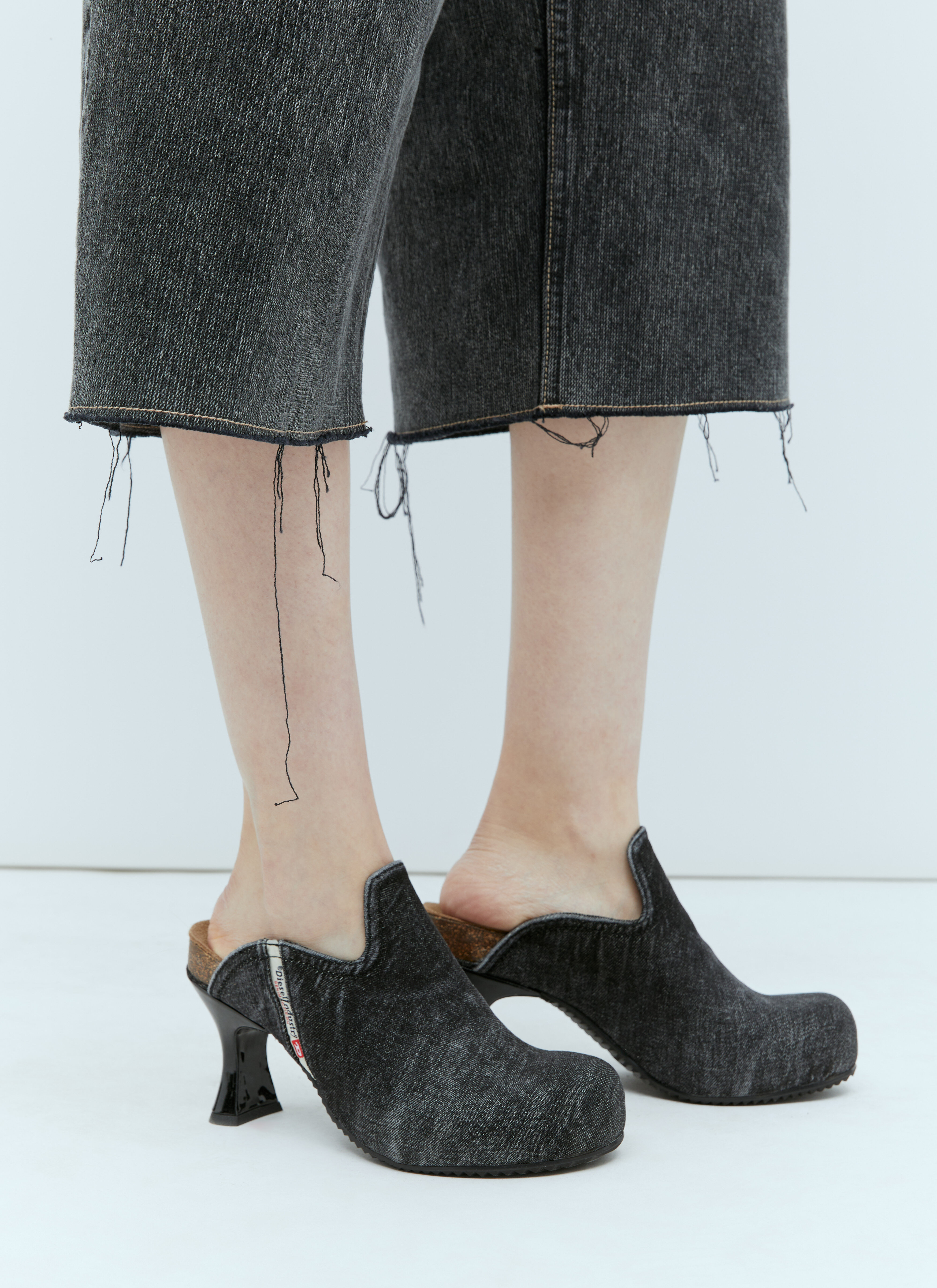 Designer top heeled mules
