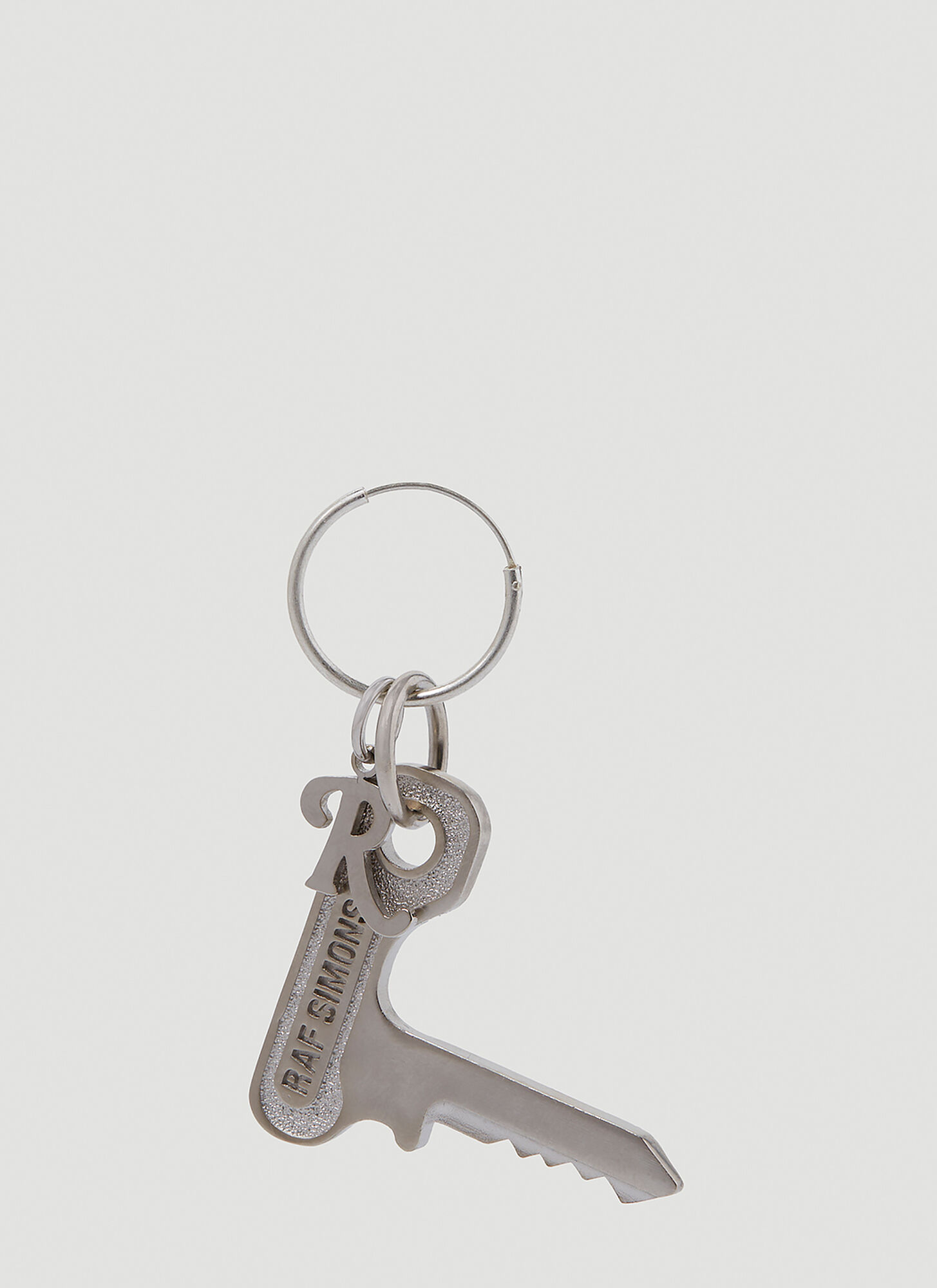 Shop Raf Simons Key Pendant Hoop Earring In Silver