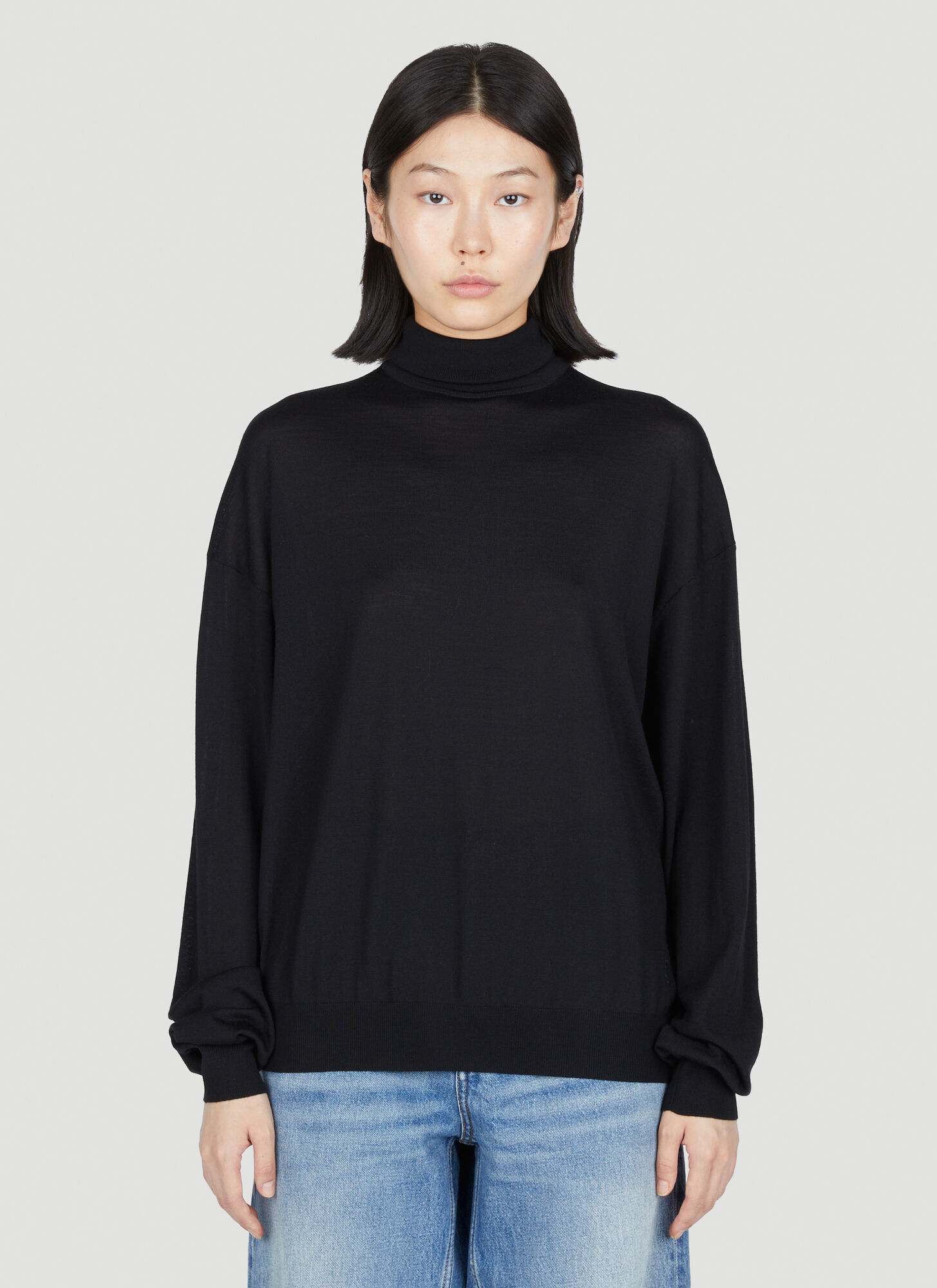Shop Saint Laurent Semi Sheer Turtleneck Sweater In Black