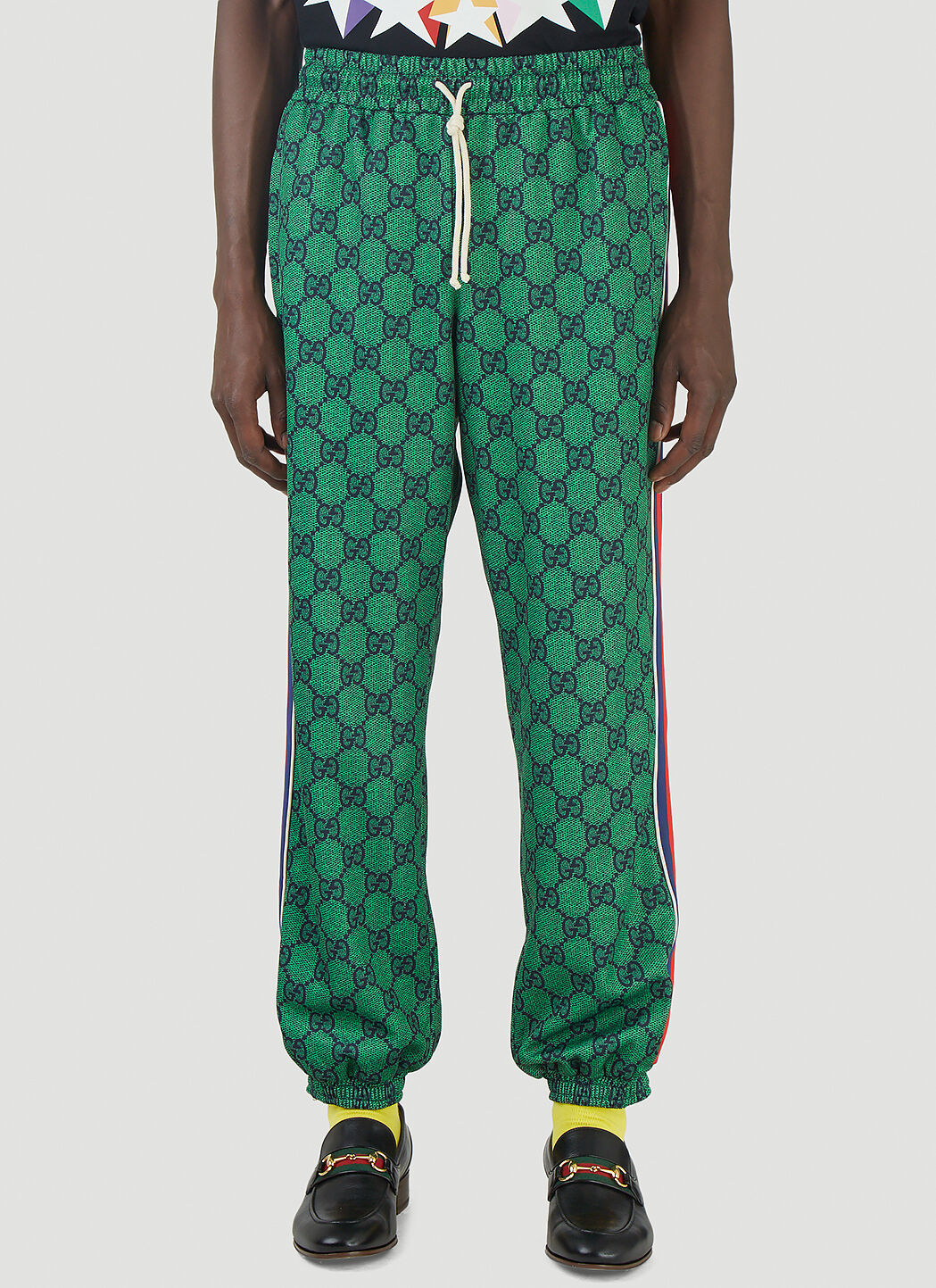 Gucci green online track pants