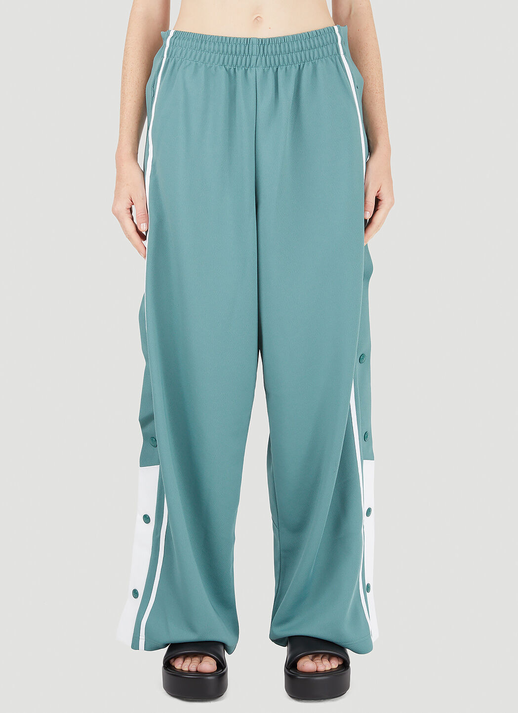 Light green track outlet pants