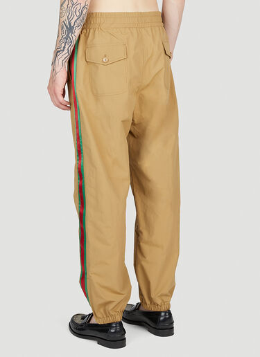 ウェブストライプ トラックパンツ Gucci ウェブストライプ トラックパンツ キャメル guc0153047