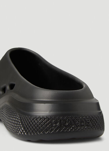 Logo Embossed Foam Mules Prada Logo Embossed Foam Mules Black pra0149039