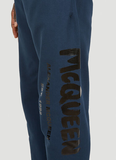 Alexander McQueen Graffiti Print Track Pants Blue amq0149010