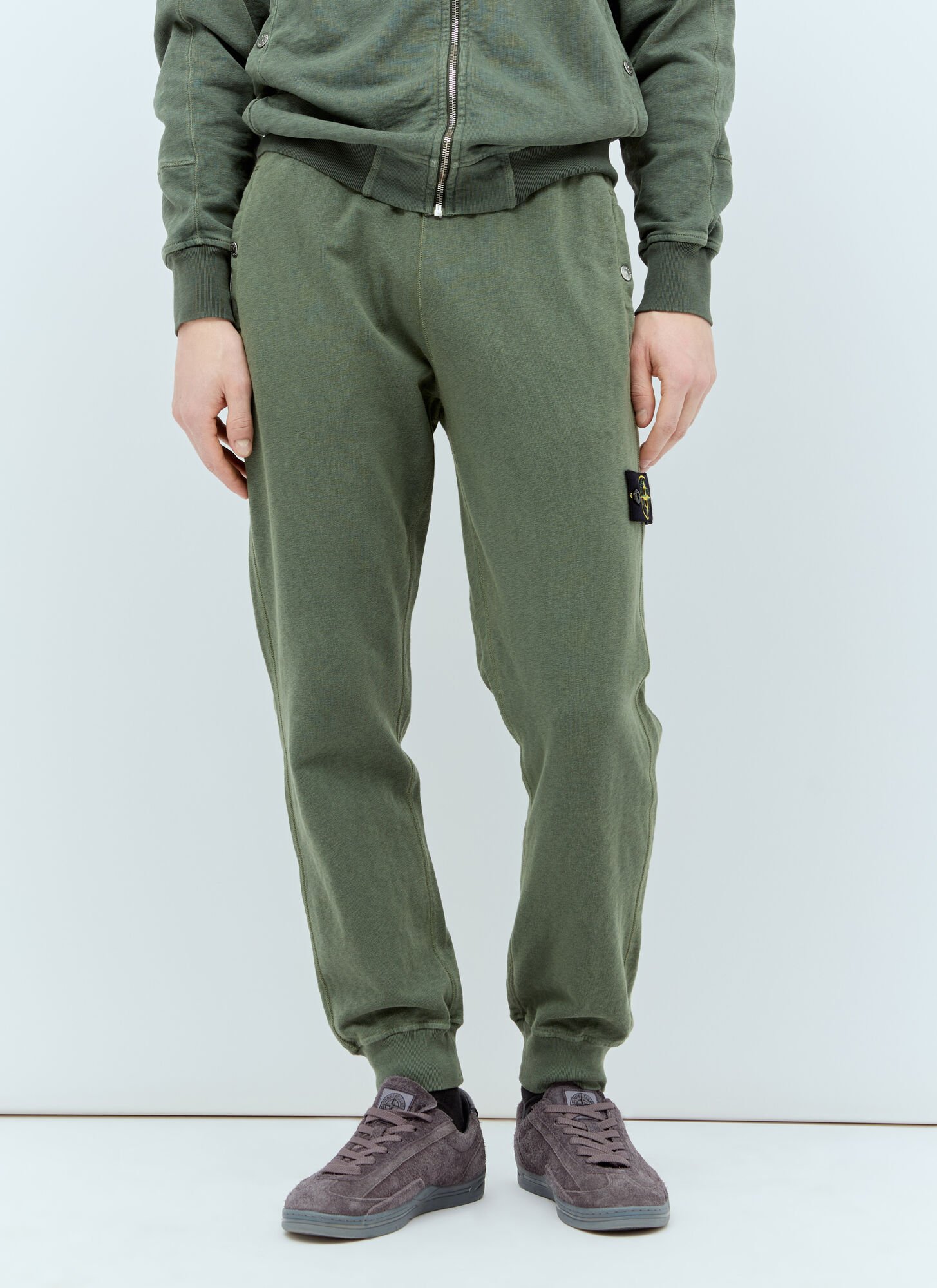 Shop Stone Island Logo Patch Track Pants In Green