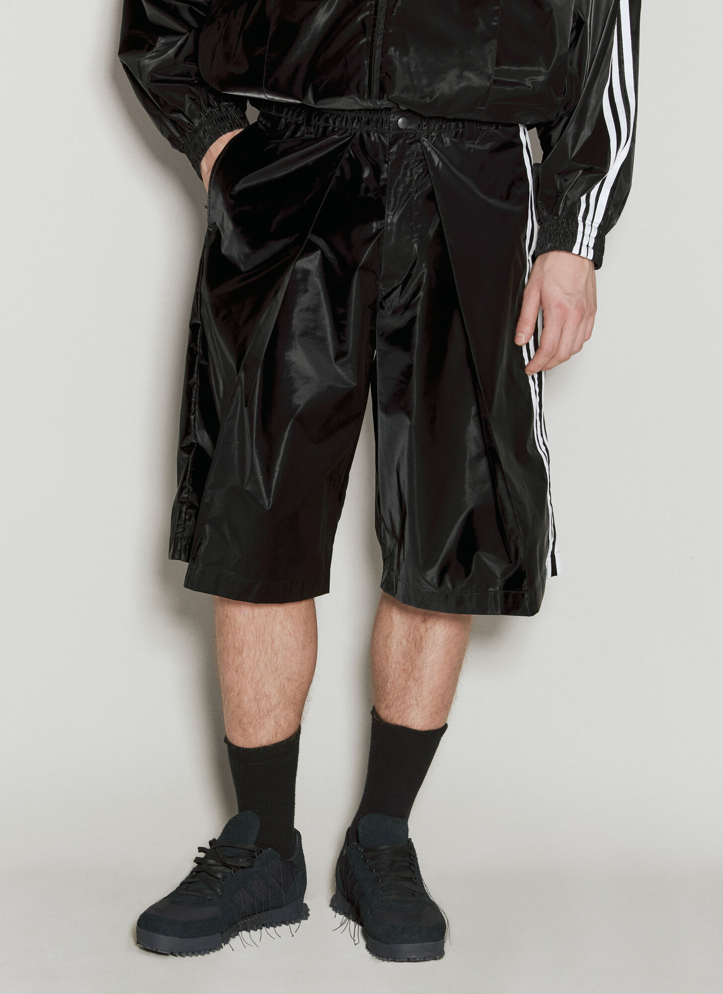 Shop Y-3 Glossy Bermuda Shorts In Black