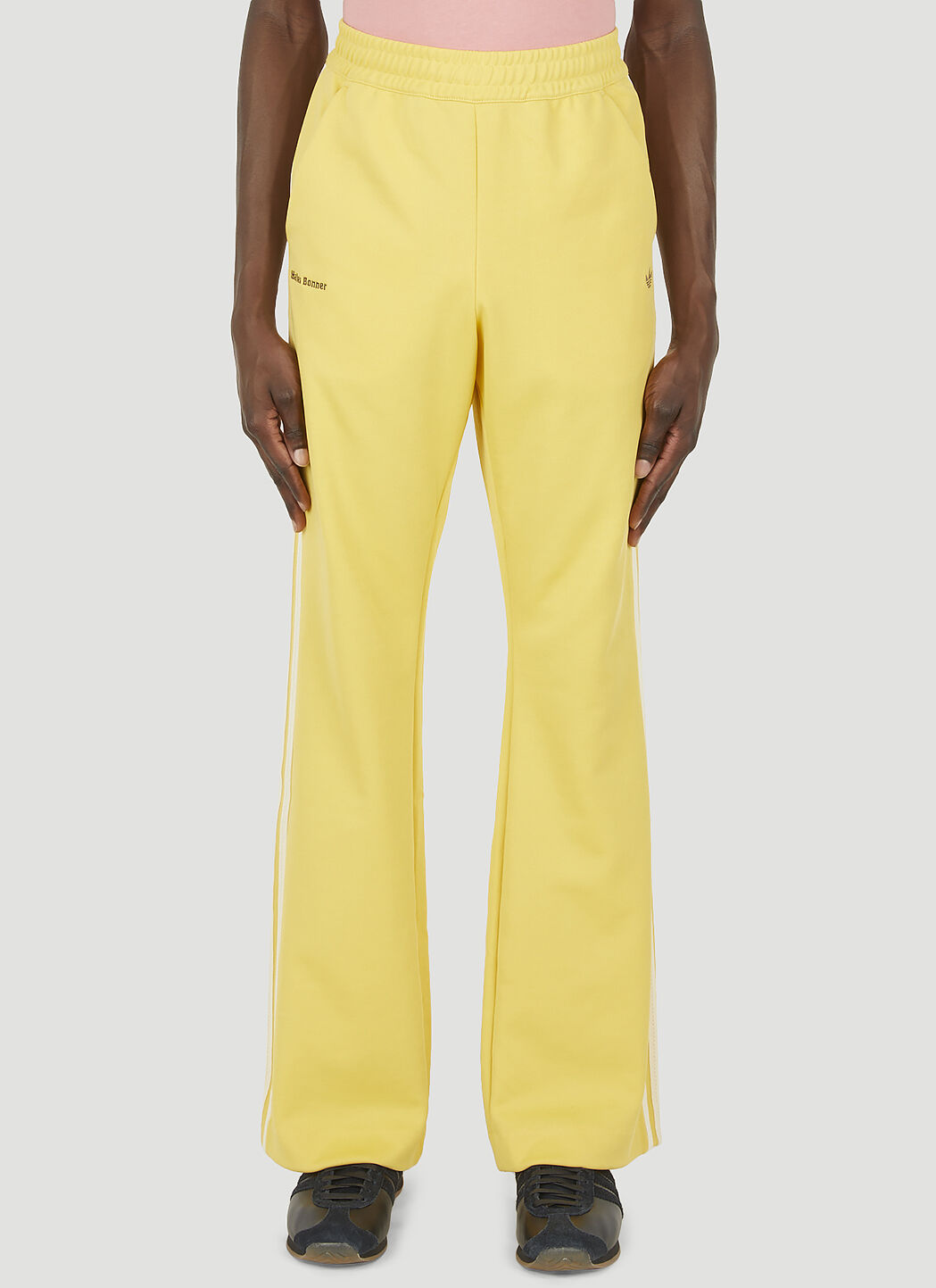 Yellow adidas track hotsell pants mens