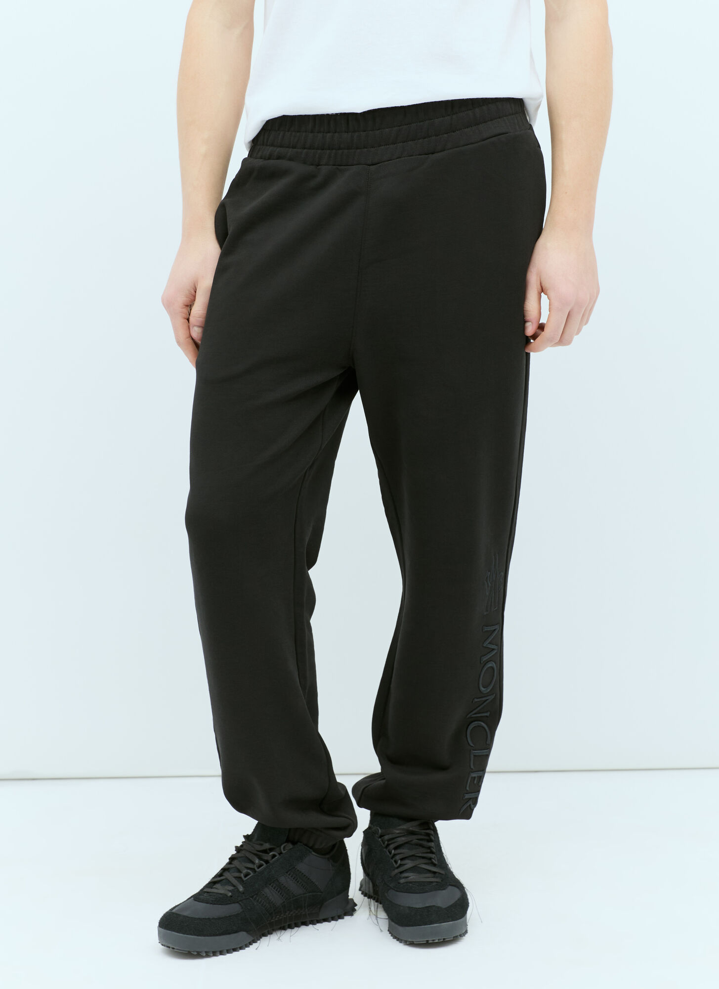 Shop Moncler Logo Embroidery Track Pants In Black
