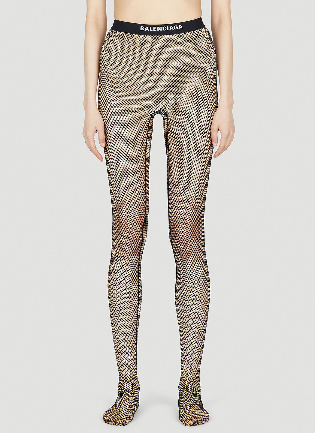 【Balenciaga】ロゴ waistband fishnet tights Logo waistband fishnet tights in black - Balenciaga | Mytheresa