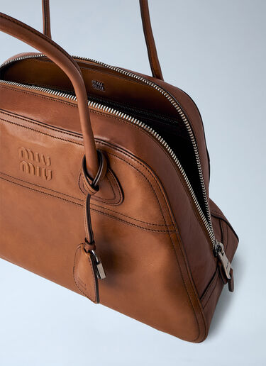LN-CC® - Miu Miu: Embossed Leather Top Handle Bag - Brown Miu Miu Embossed Leather Top Handle Bag Brown miu0265024