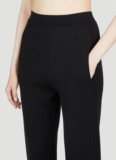 テーパードトラックパンツ Saint Laurent テーパードトラックパンツ ブラック sla0252005