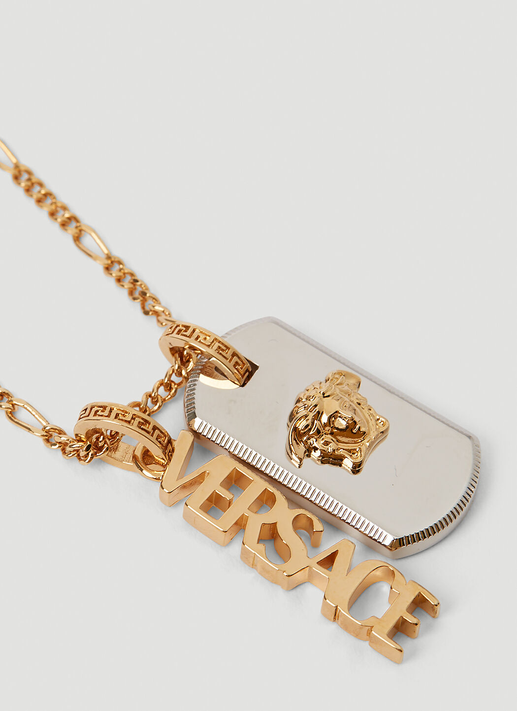 Medusa necklace with tag top