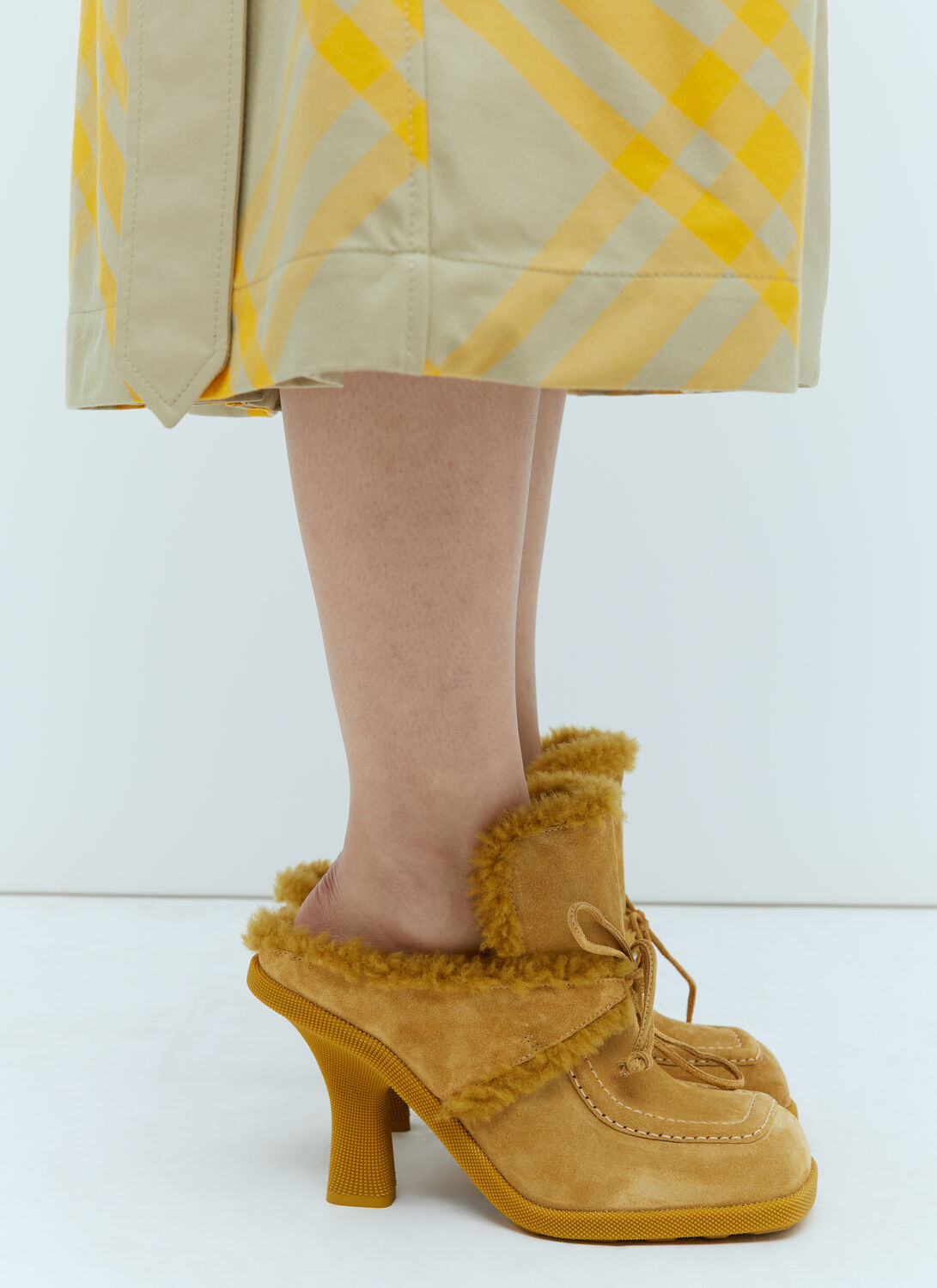 Shop Burberry Suede And Shearling Heeled Mules In Yellow