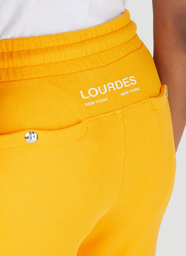 Lourdes スパンコール グラフィックトラックパンツ オレンジ lou0346009