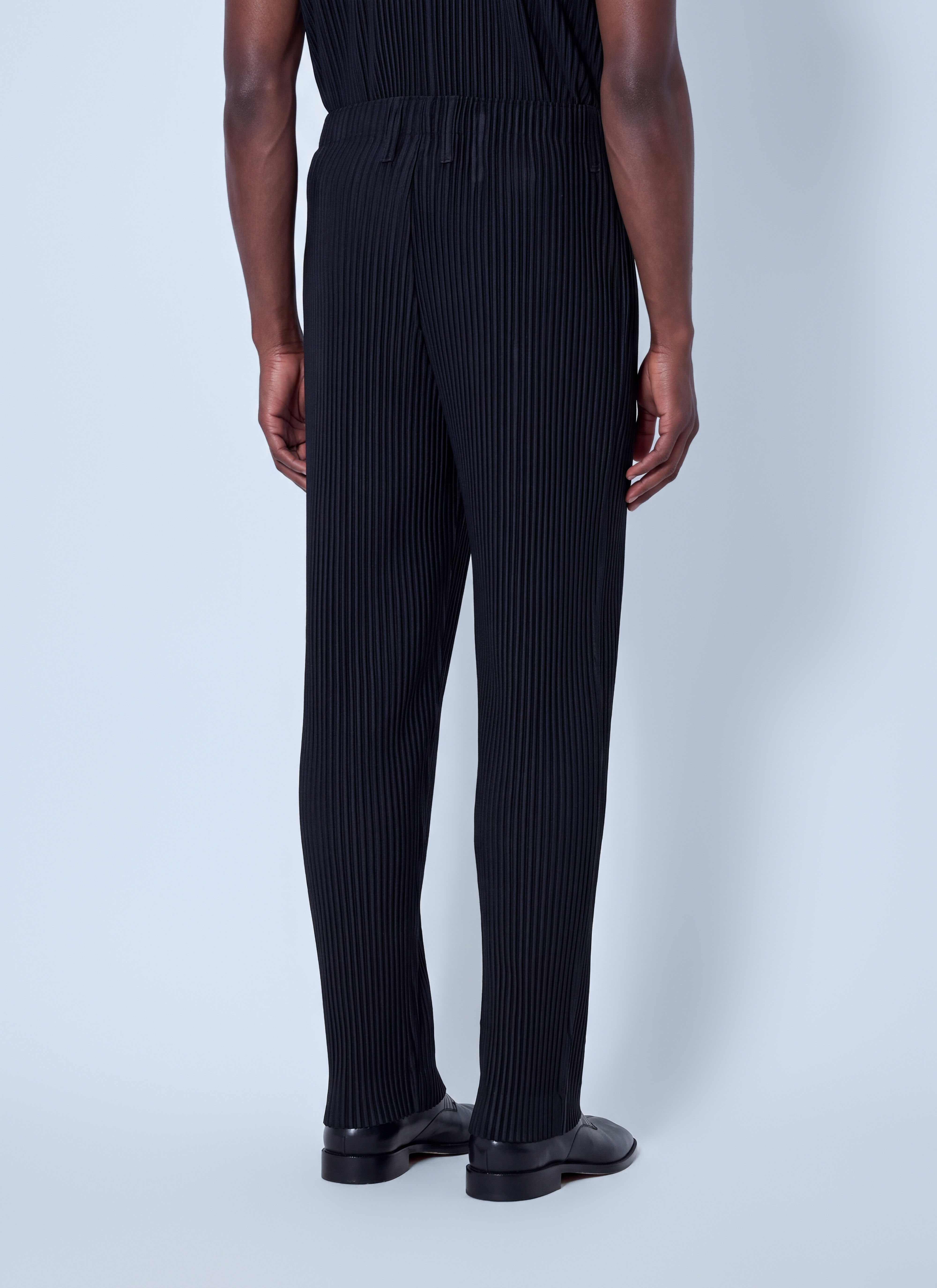Homme Plissé Issey Miyake Men's' Basics Pleated Trousers in Black