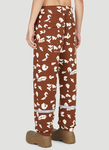 UNDERCOVER Graphic Print Track Pants Brown und0150013