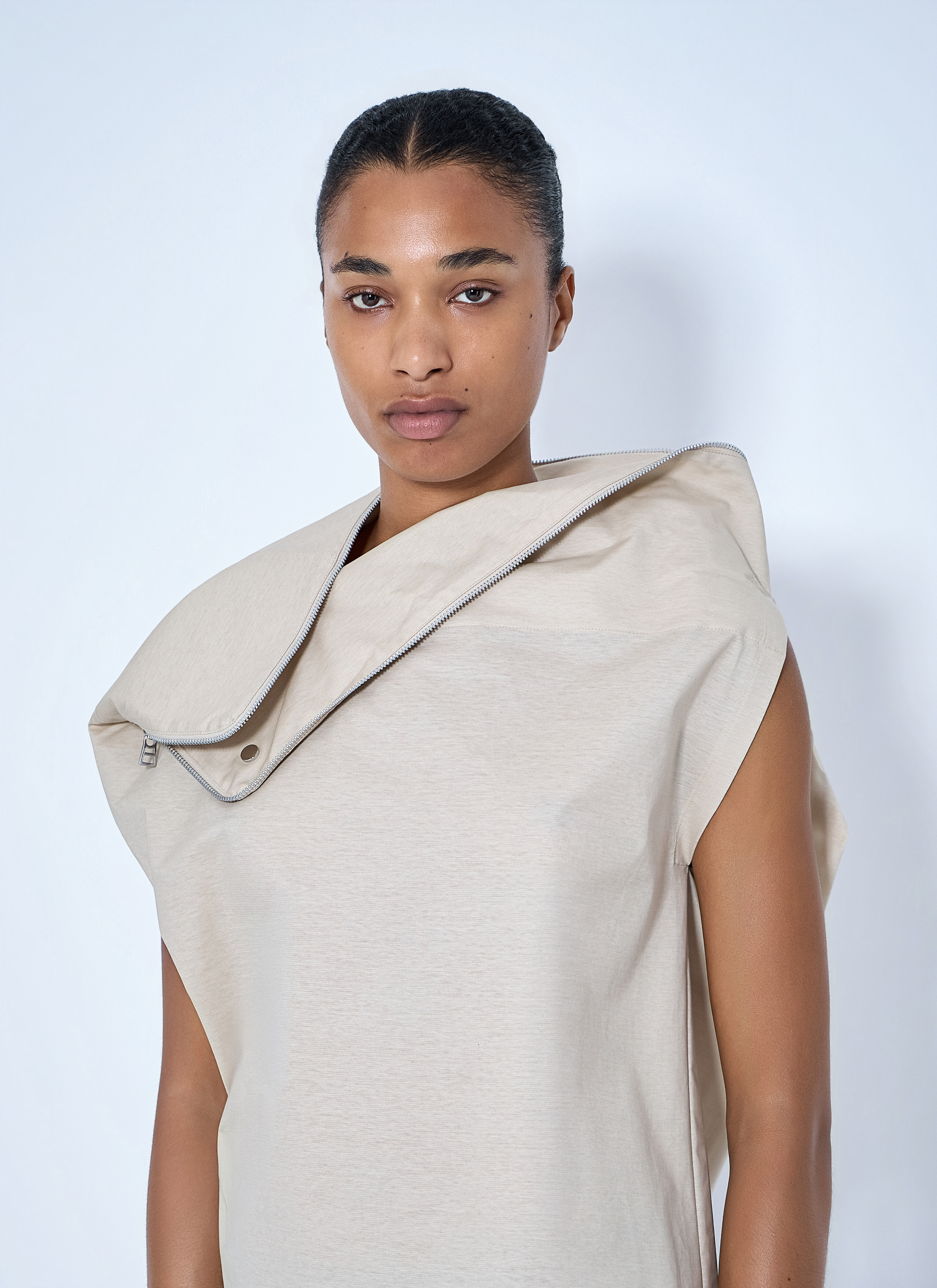 ISSEYMIYAKE ノースリーブ Issey Miyake Women's' Asymmetric Zip Detail Top in Beige | LN-CC®