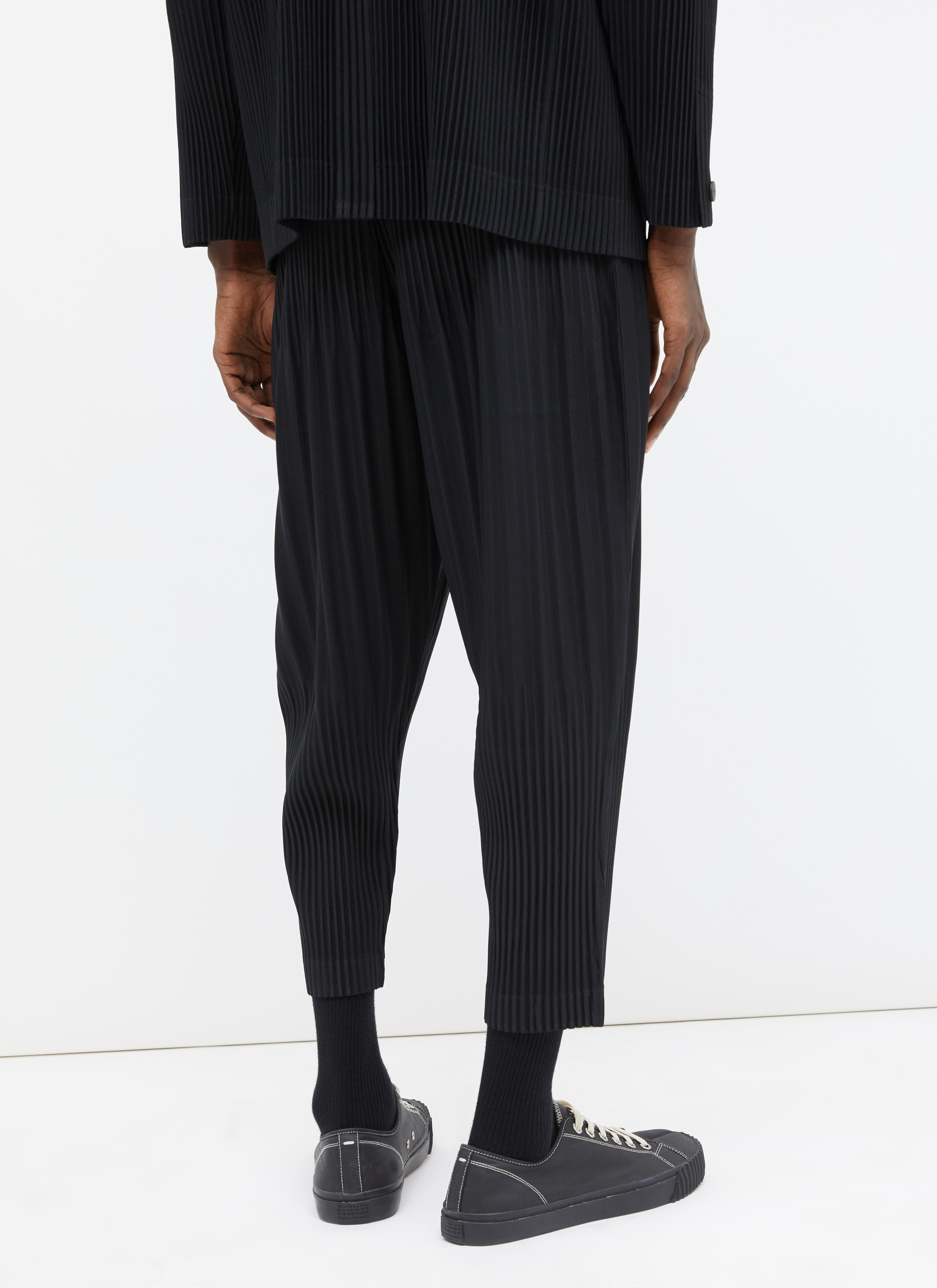 Homme Plissé Issey Miyake Men's' Tapered Pleated Pants in Black | LN-CC®