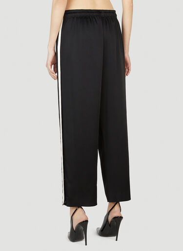Saint Laurent 로고 프린트 팬츠 블랙 sla0251058