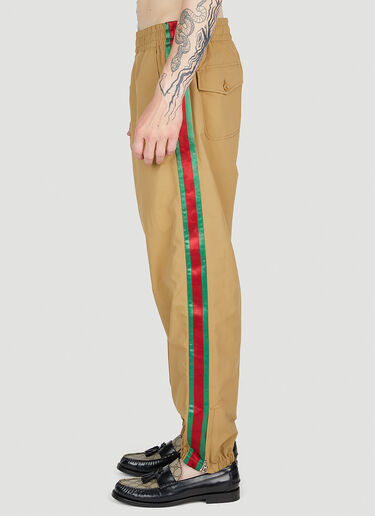 ウェブストライプ トラックパンツ Gucci ウェブストライプ トラックパンツ キャメル guc0153047