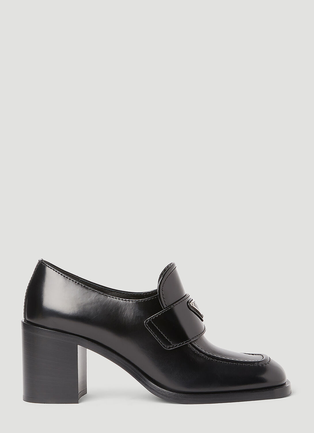 Shop Prada Logo Plaque Heeled Loafers In Black