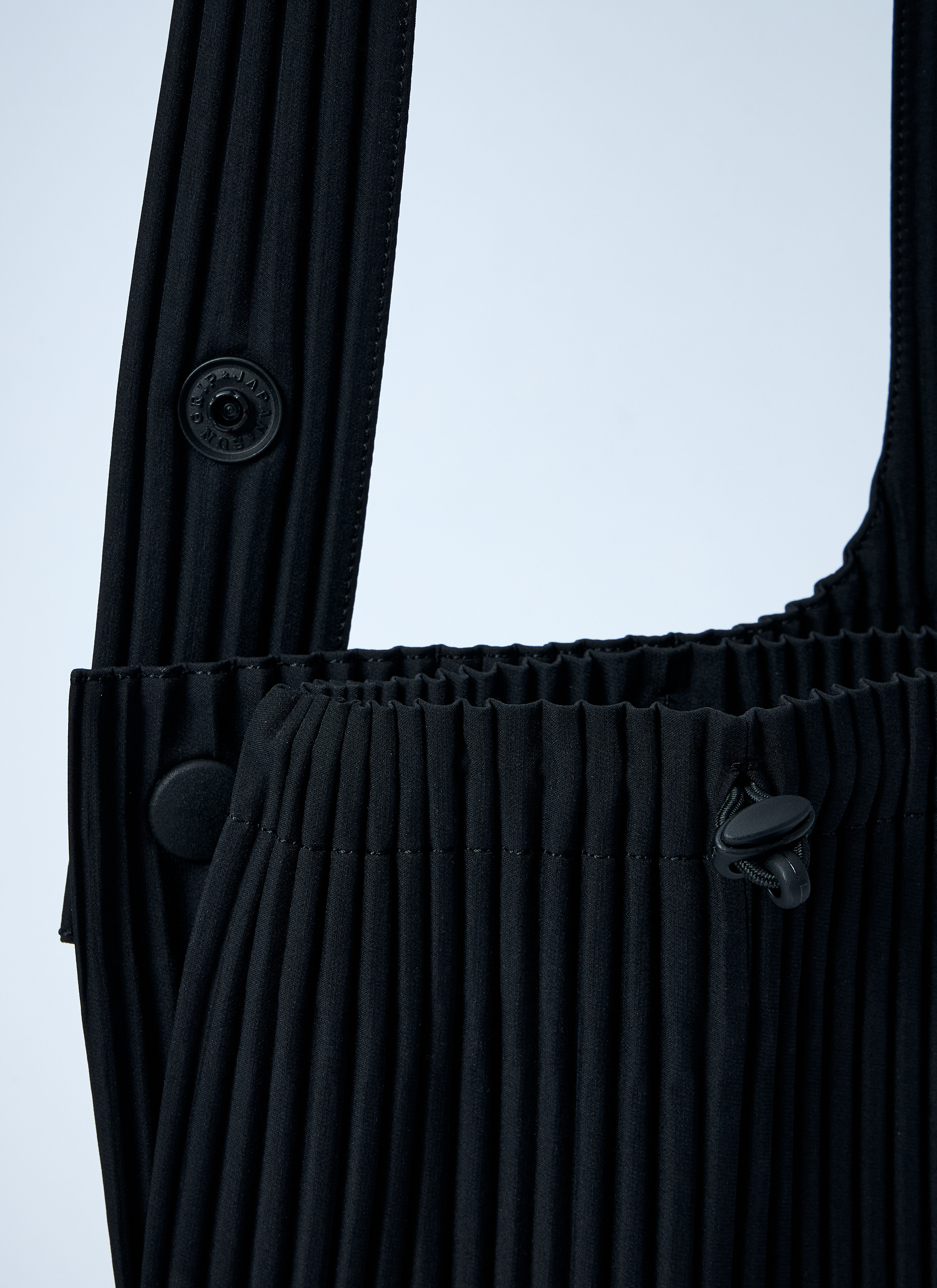 Homme Plissé Issey Miyake Men's' Pocket Crossbody Bag in Black