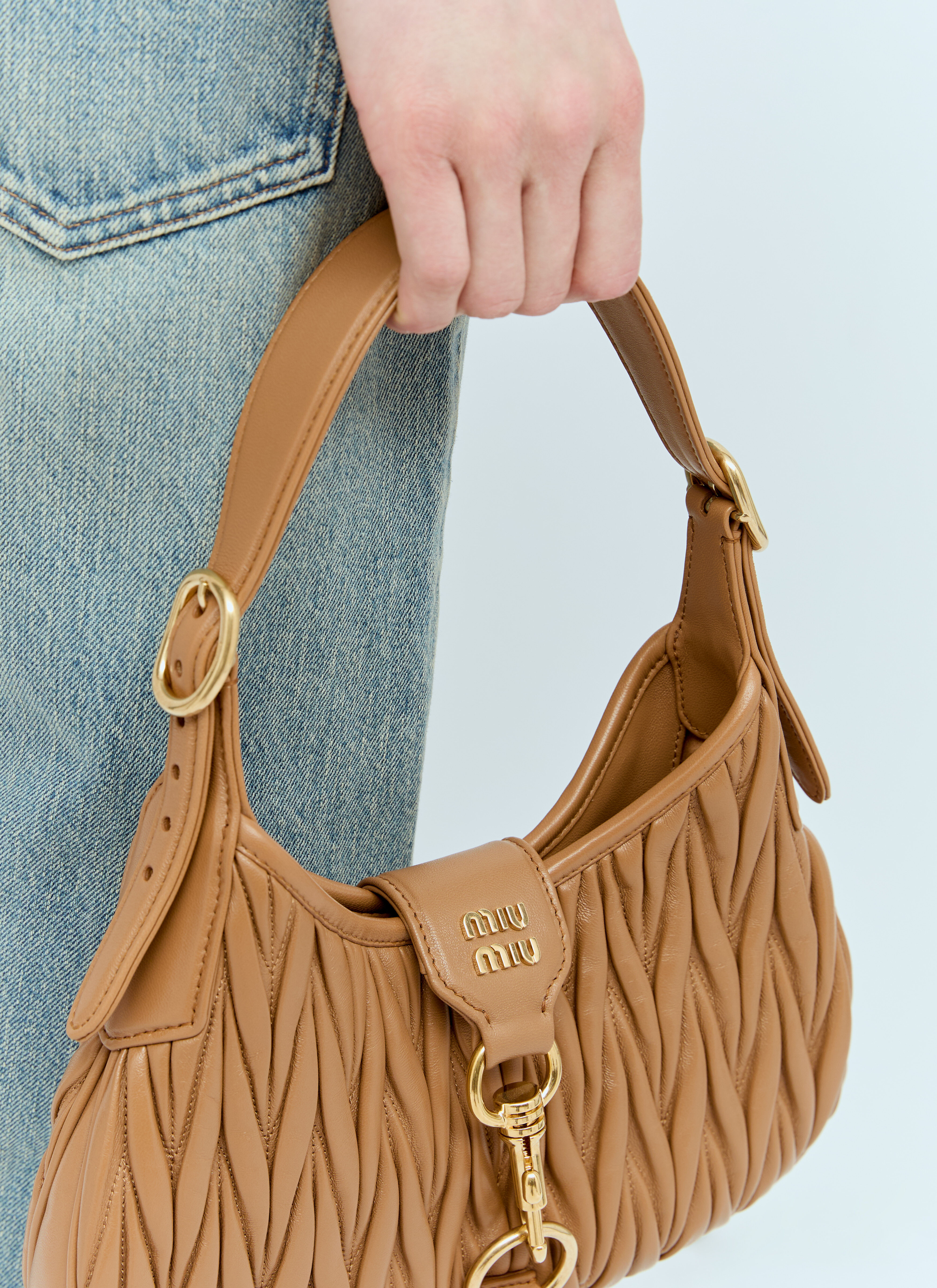 Miu Miu Women s Logo Plaque Matelasse Shoulder Bag in Brown LN CC
