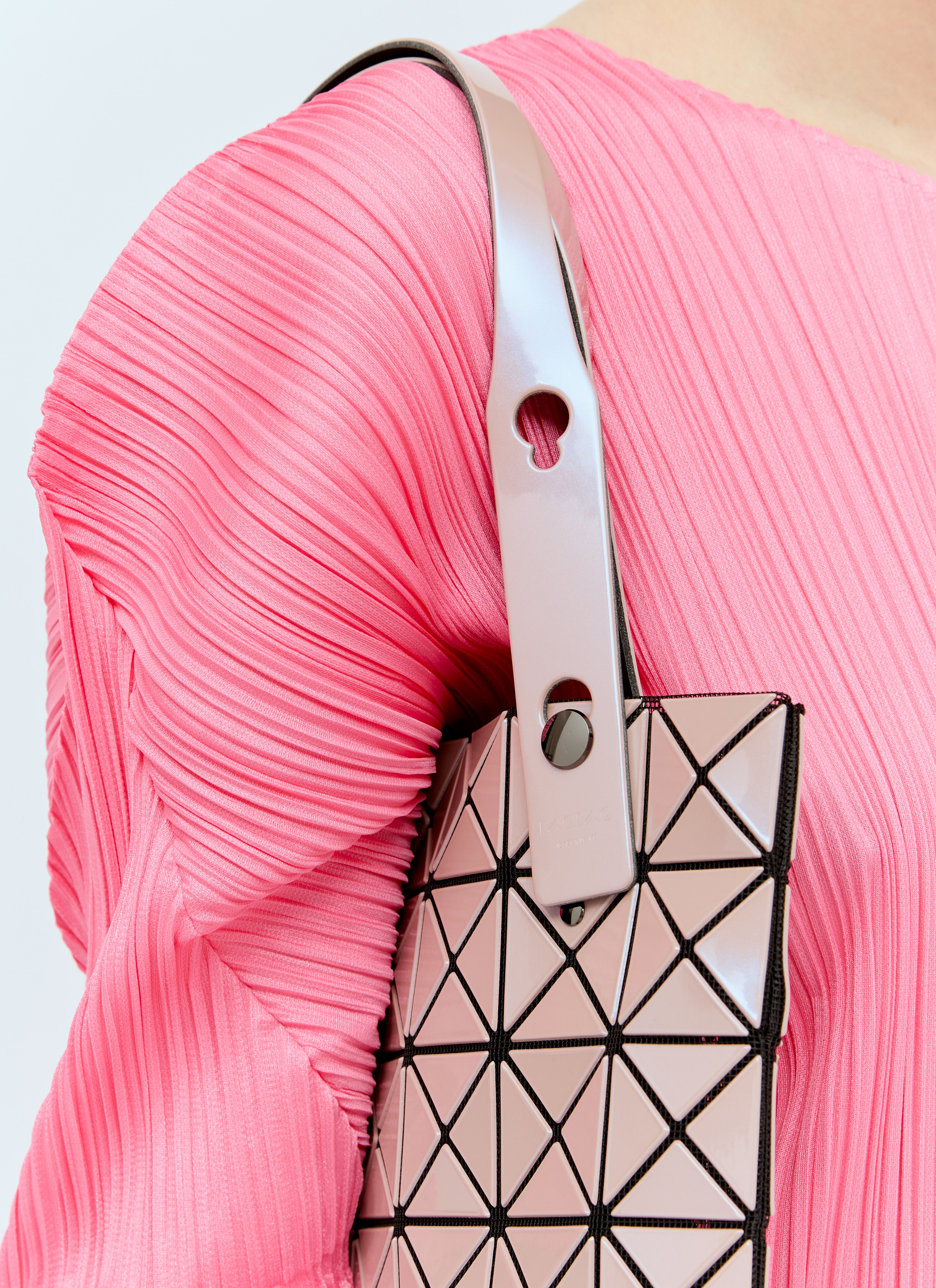 Issey miyake triangle bag best sale