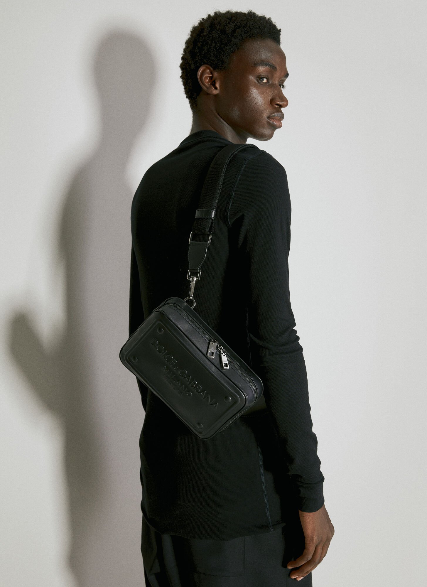 Shop Dolce & Gabbana Embossed Logo Leather Crossbody Bag In Black