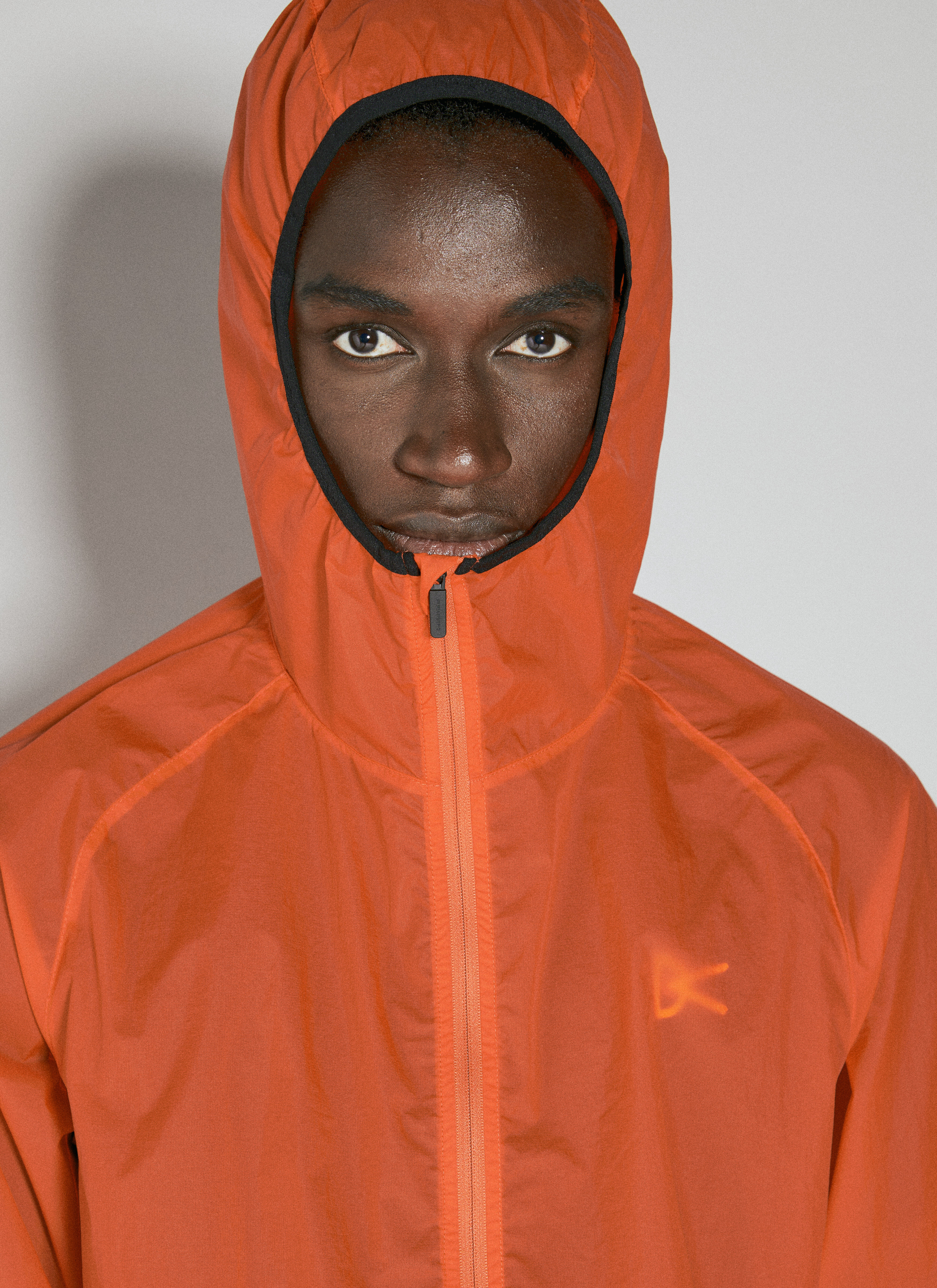 District Vision Men s Ultralight Packable DWR Wind Jacket in Orange LN CC