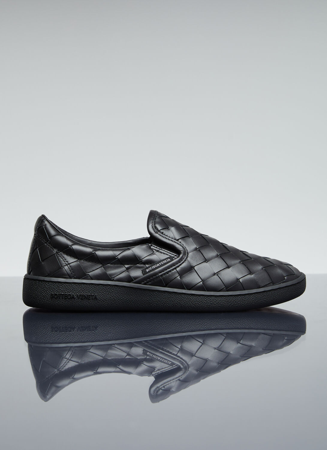 Shop Bottega Veneta Intrecciato Slip-on Shoes In Black