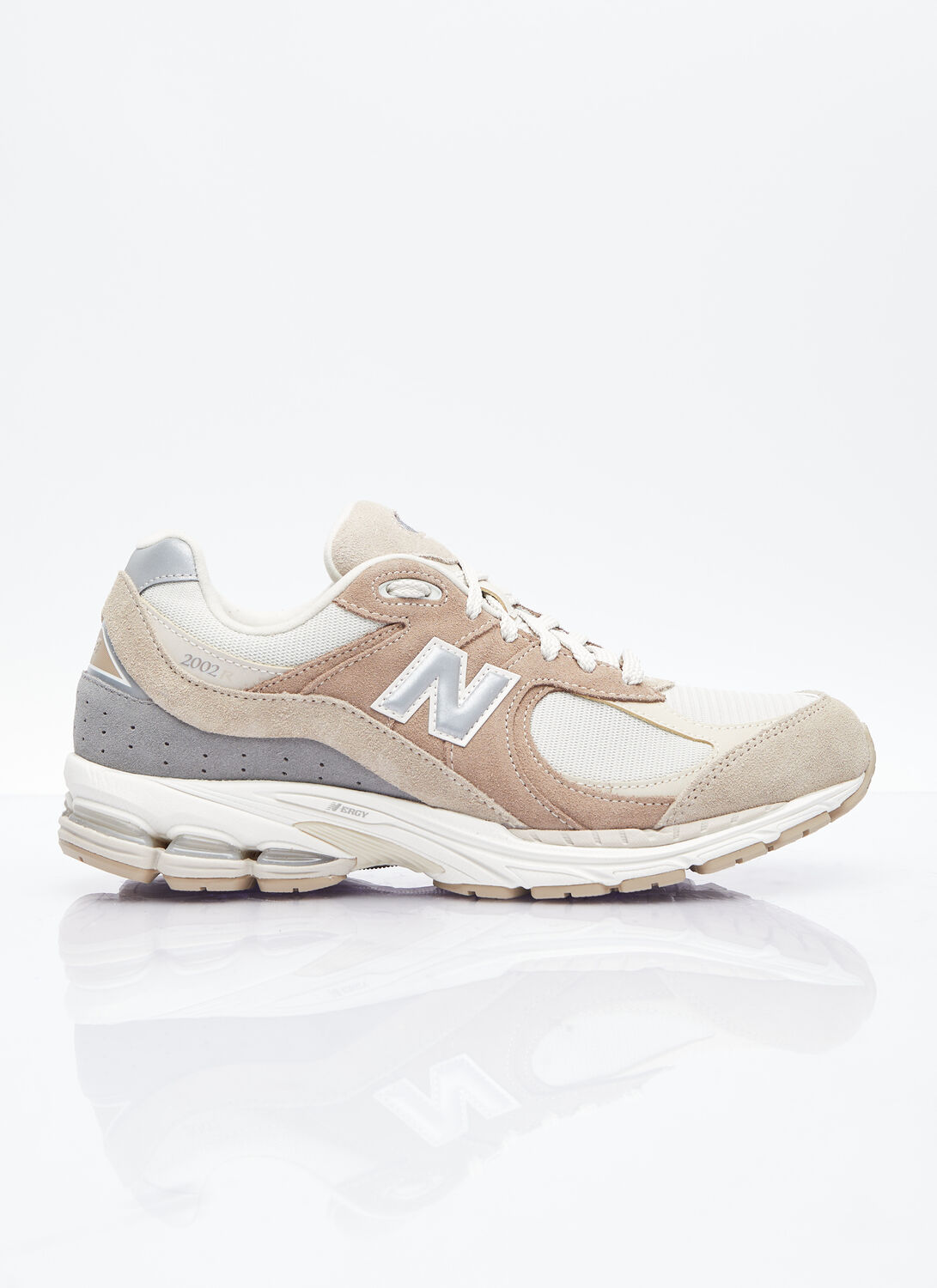 New Balance 2002r Sneaker In Off White/grey/white