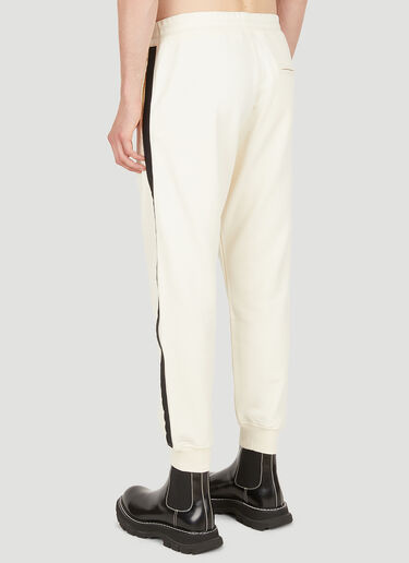 Alexander McQueen 侧条纹运动长裤 乳白 amq0150003