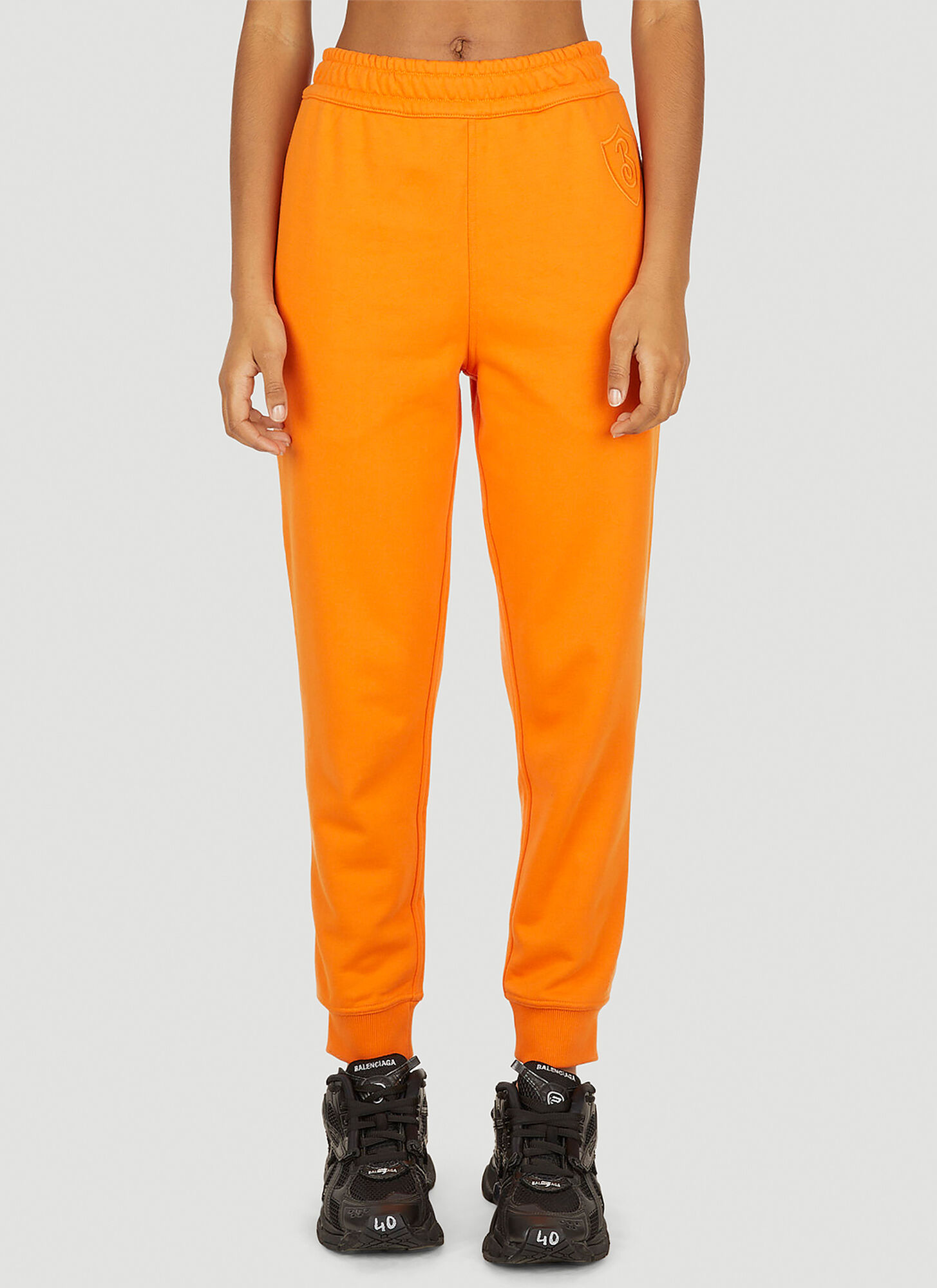 Burberry Logo Patch Cotton Track Pants In Orange