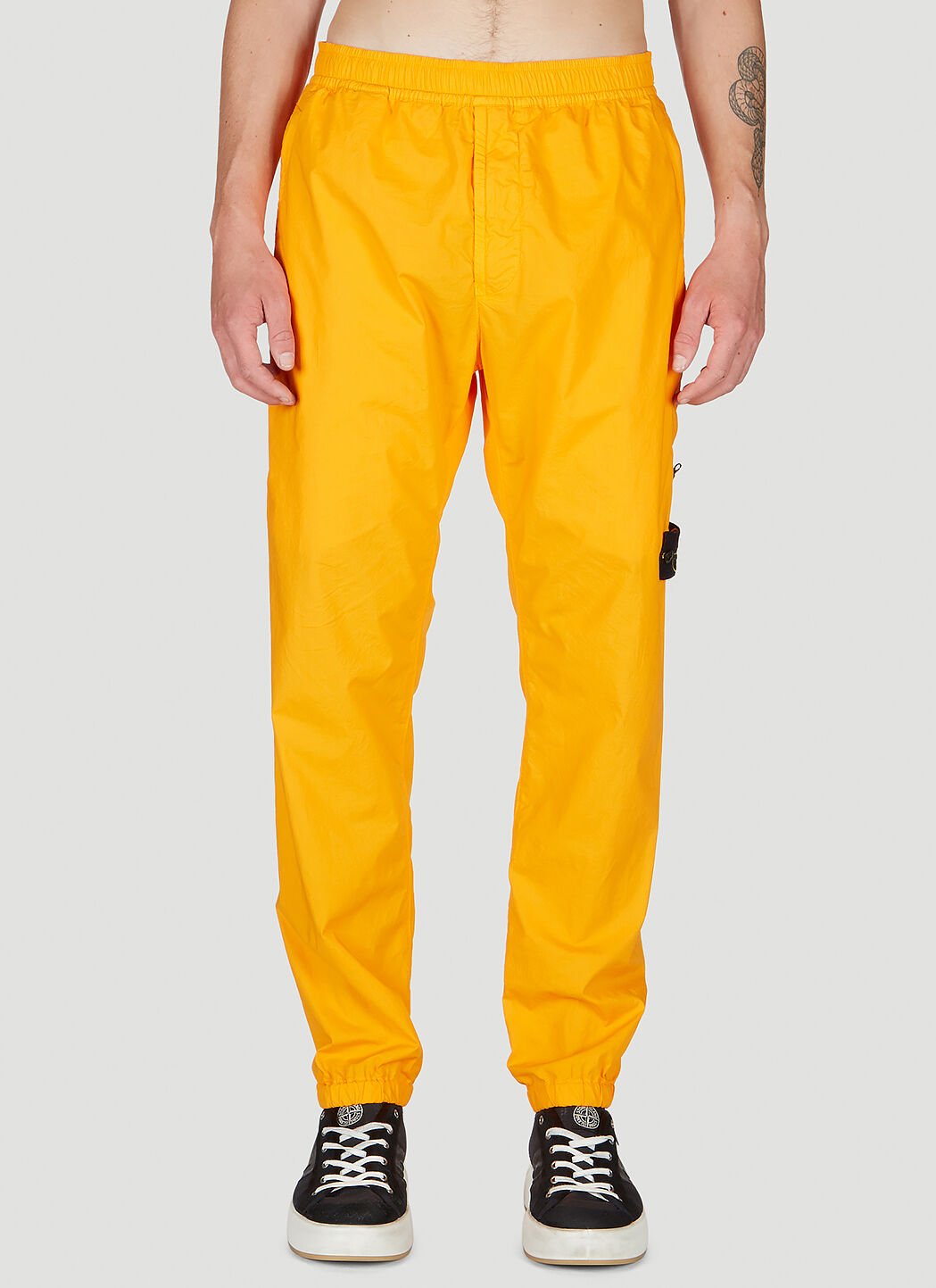 Stone island logo shop patch track pants