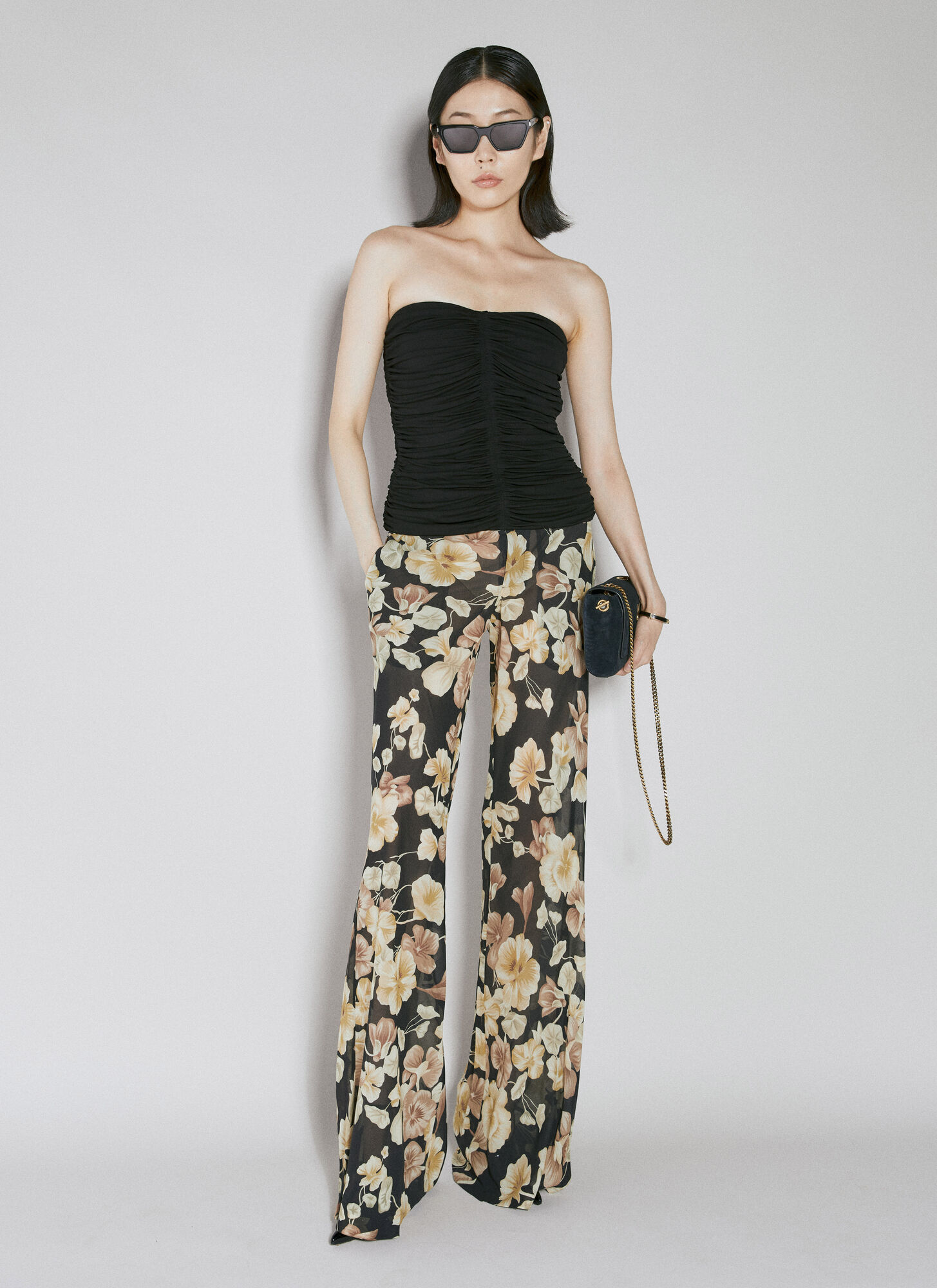 Shop Saint Laurent Semi-sheer Floral Print Pants In Black