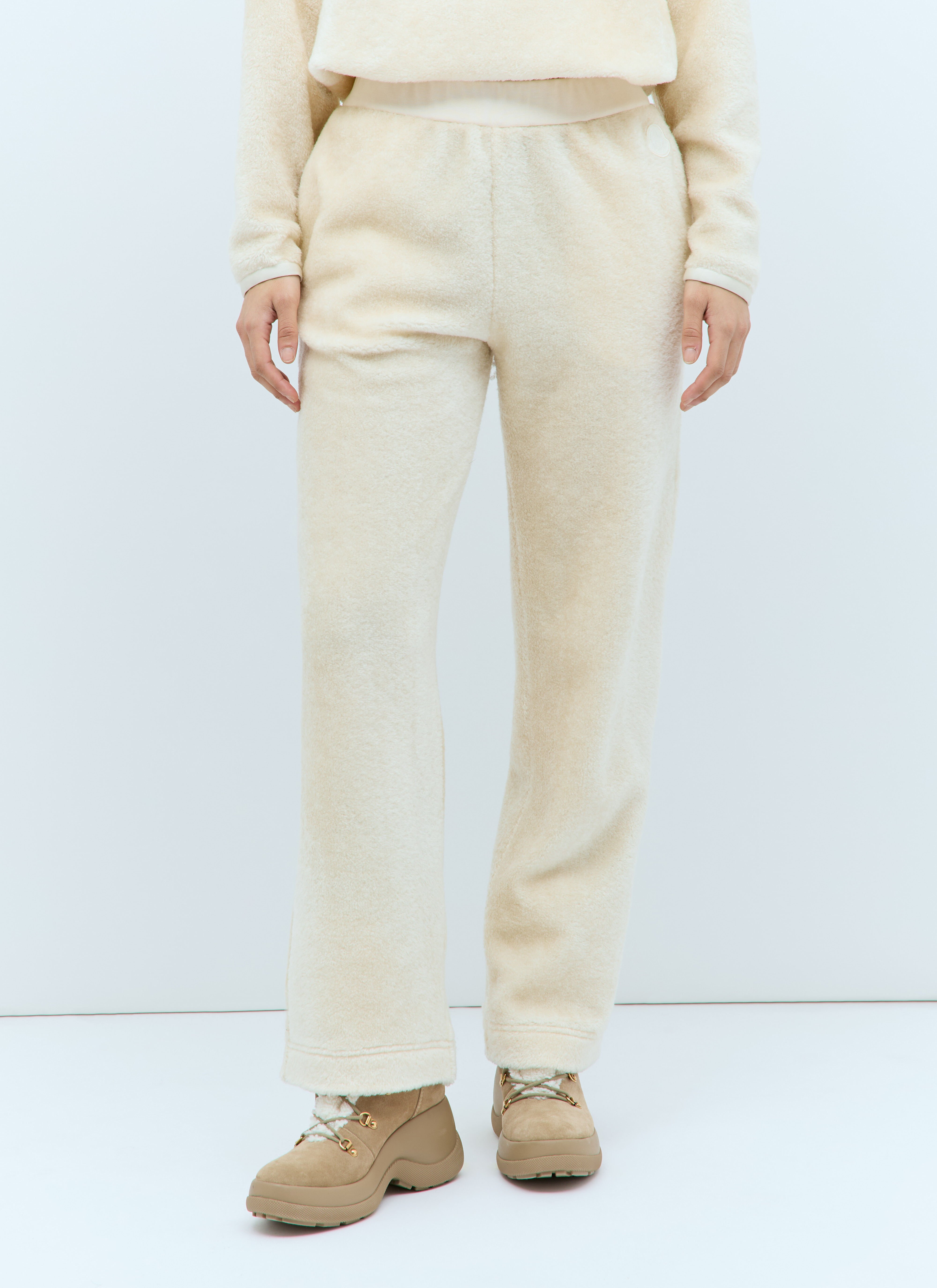 Cream track pants online
