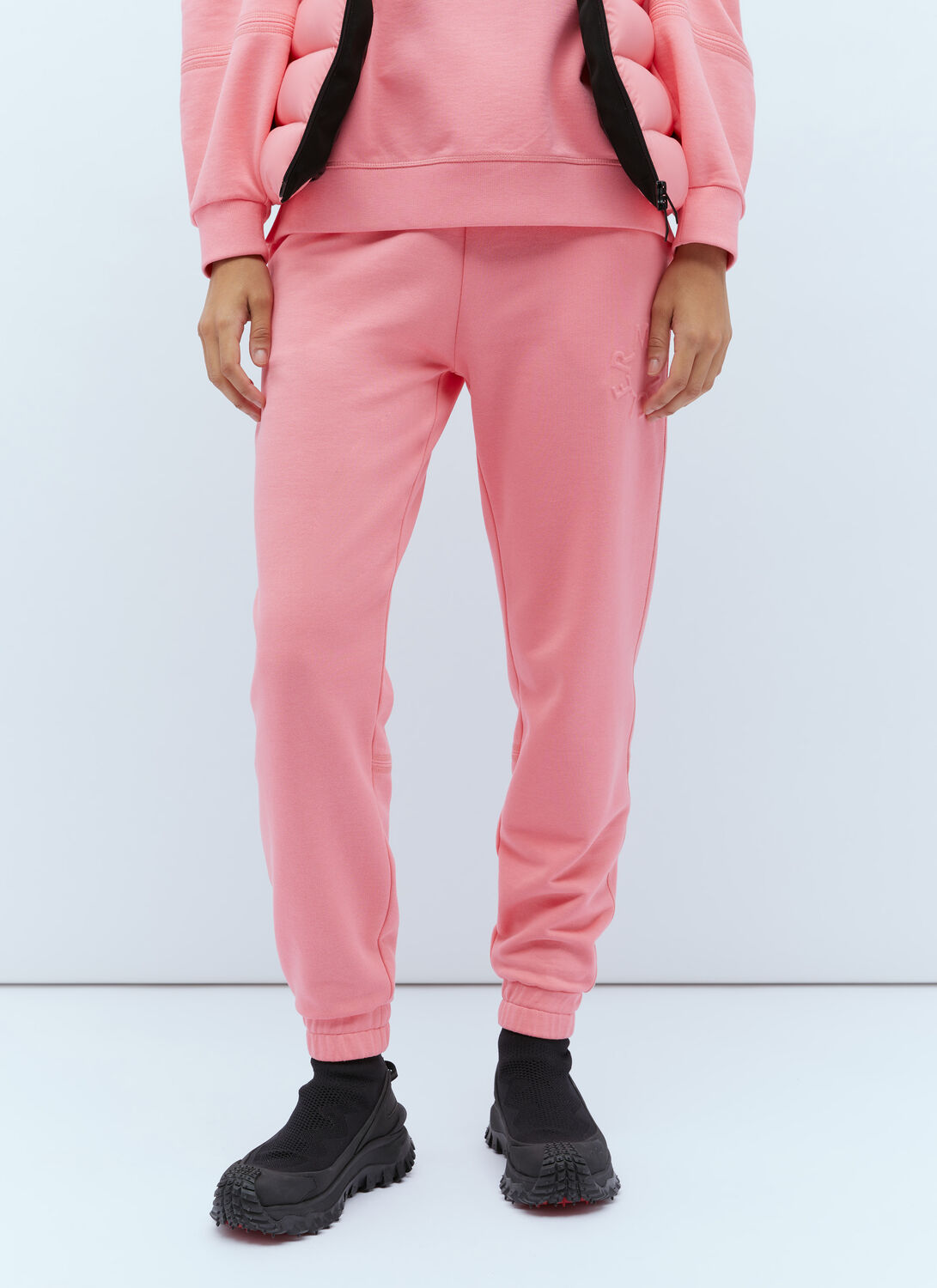 Shop Moncler Embossed Logo Track Pants In Pink