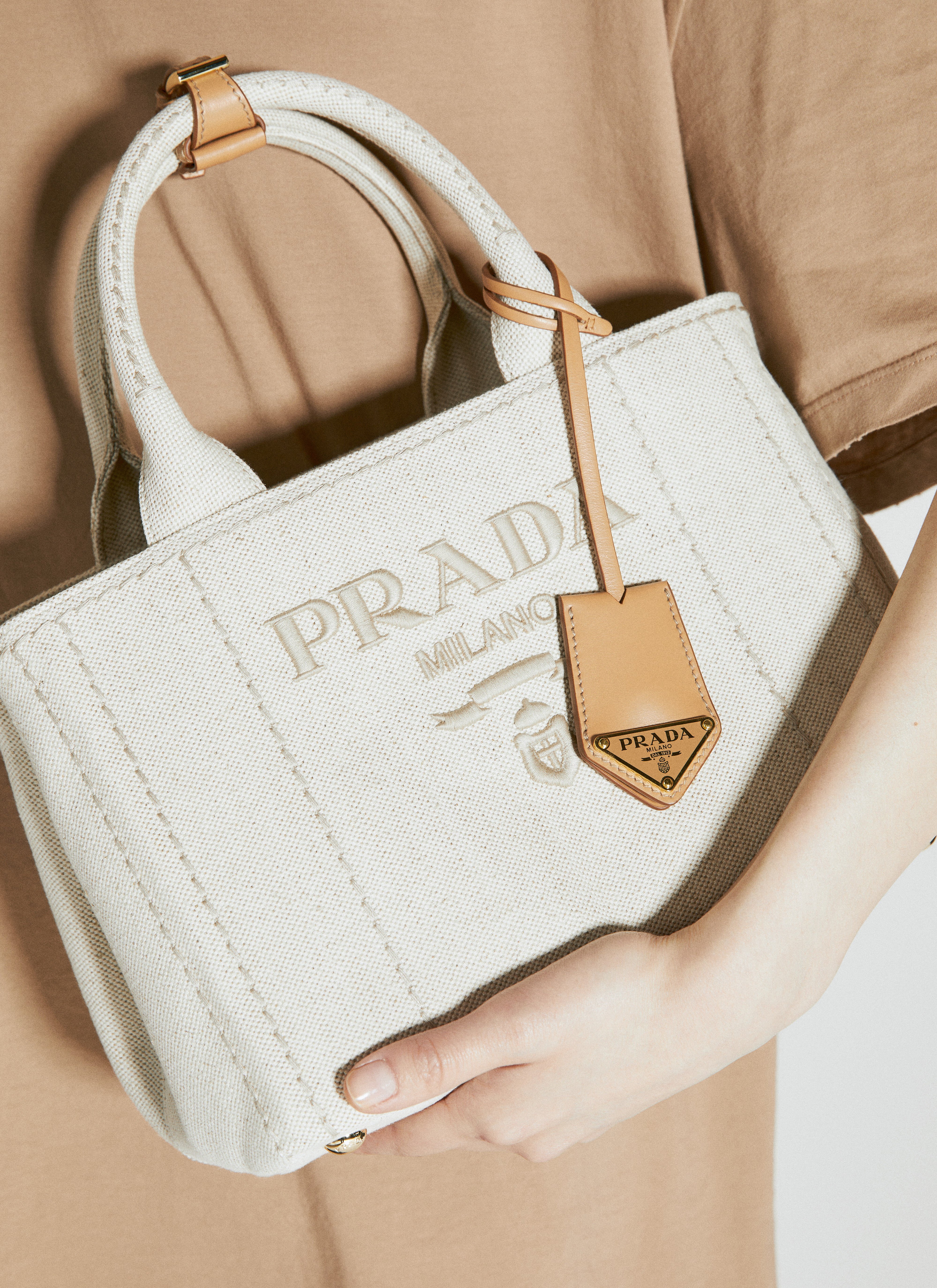 Prada emblem bag hot sale
