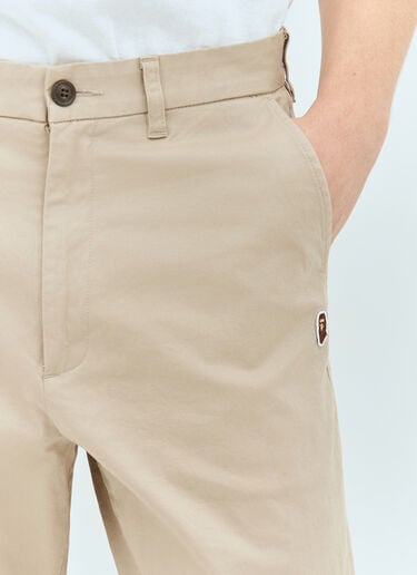 Ape Head One Point Chino Pants A BATHING APE® Ape Head One Point Chino Pants Beige aba0156003