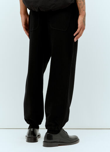로고 프린트 트랙 팬츠 Comme des Garçons Homme 로고 프린트 트랙 팬츠 블랙 cdh0156015