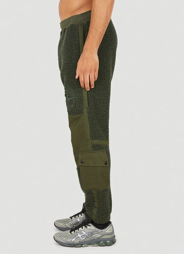 Stone Island 컬러 블록 테디 트랙 팬츠 그린 sto0150033