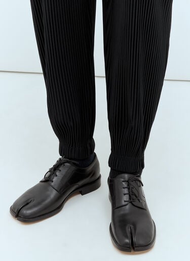 Homme Plissé Issey Miyake Tapered Pleated Pants Black hmp0157009