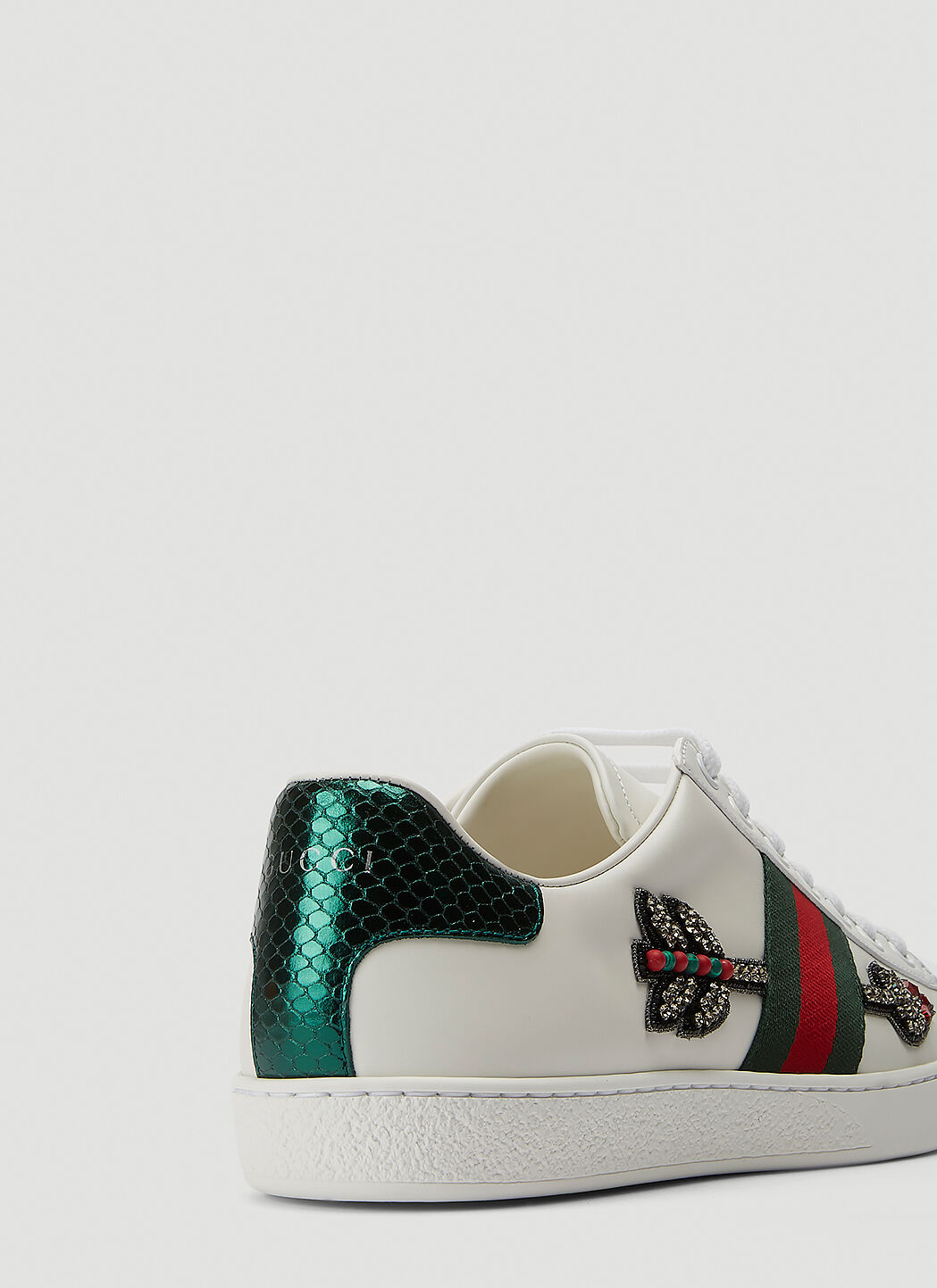 Gucci trainers sales with arrow