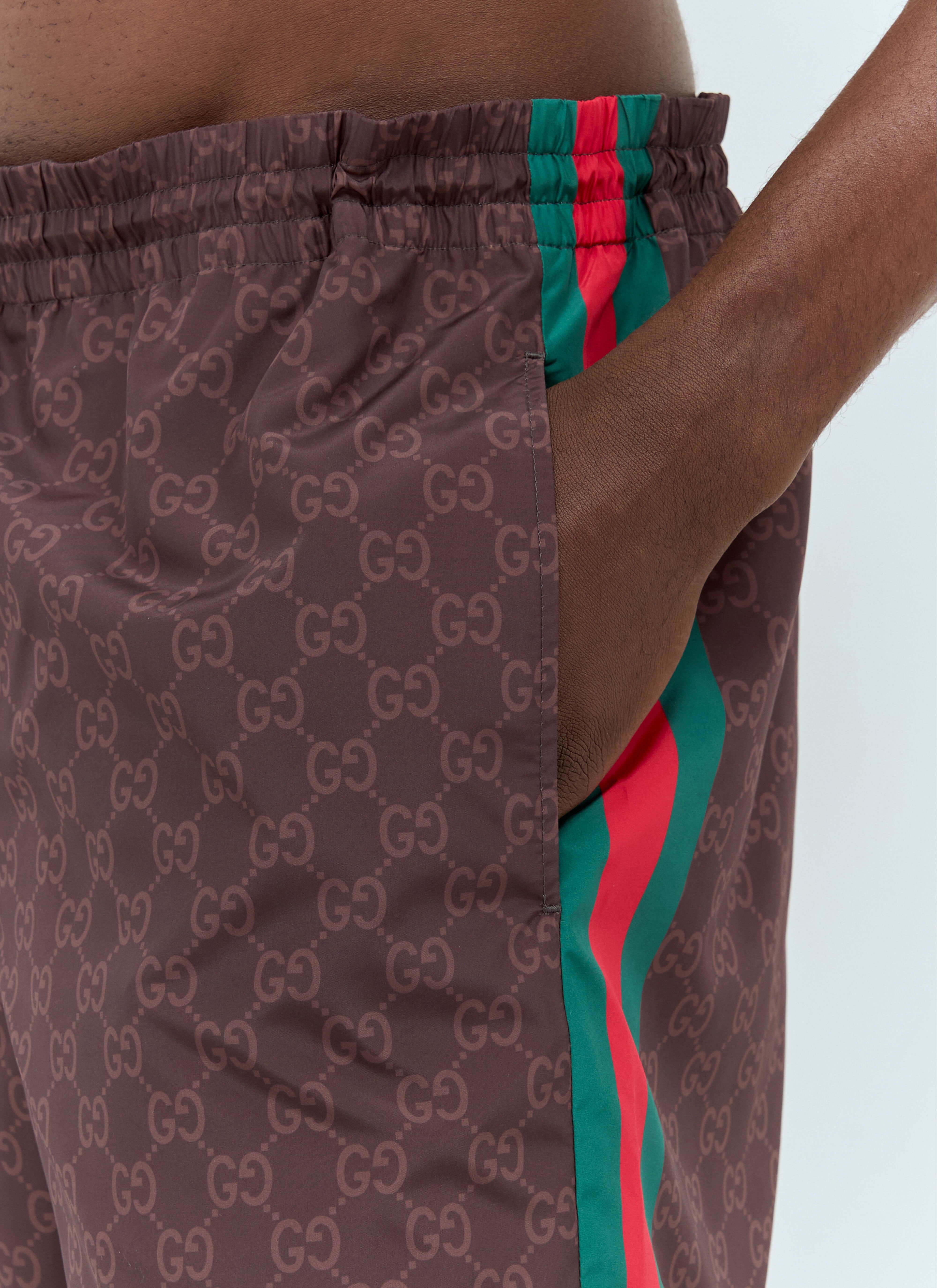 Red gucci swim shorts deals